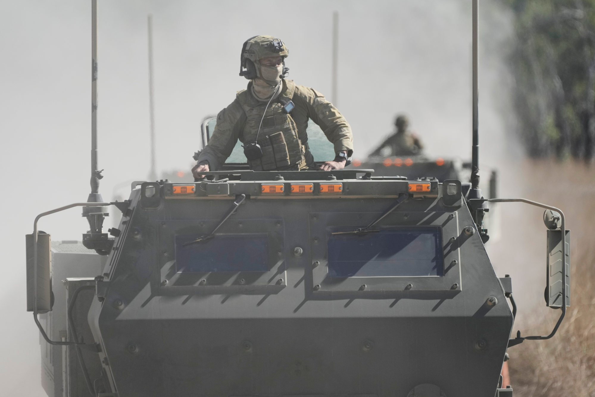 Australian soldiers drive their High Mobility Artillery Rocket System for firing during Exercise Talisman Sabre 2025 at Shoalwater Bay Training Area, near Rockhampton, Australia, on Monday. Photo: AP Australian soldiers drive their High Mobility Artillery Rocket System for firing during Exercise Talisman Sabre 2025 at Shoalwater Bay Training Area, near Rockhampton, Australia, on Monday. Photo: AP