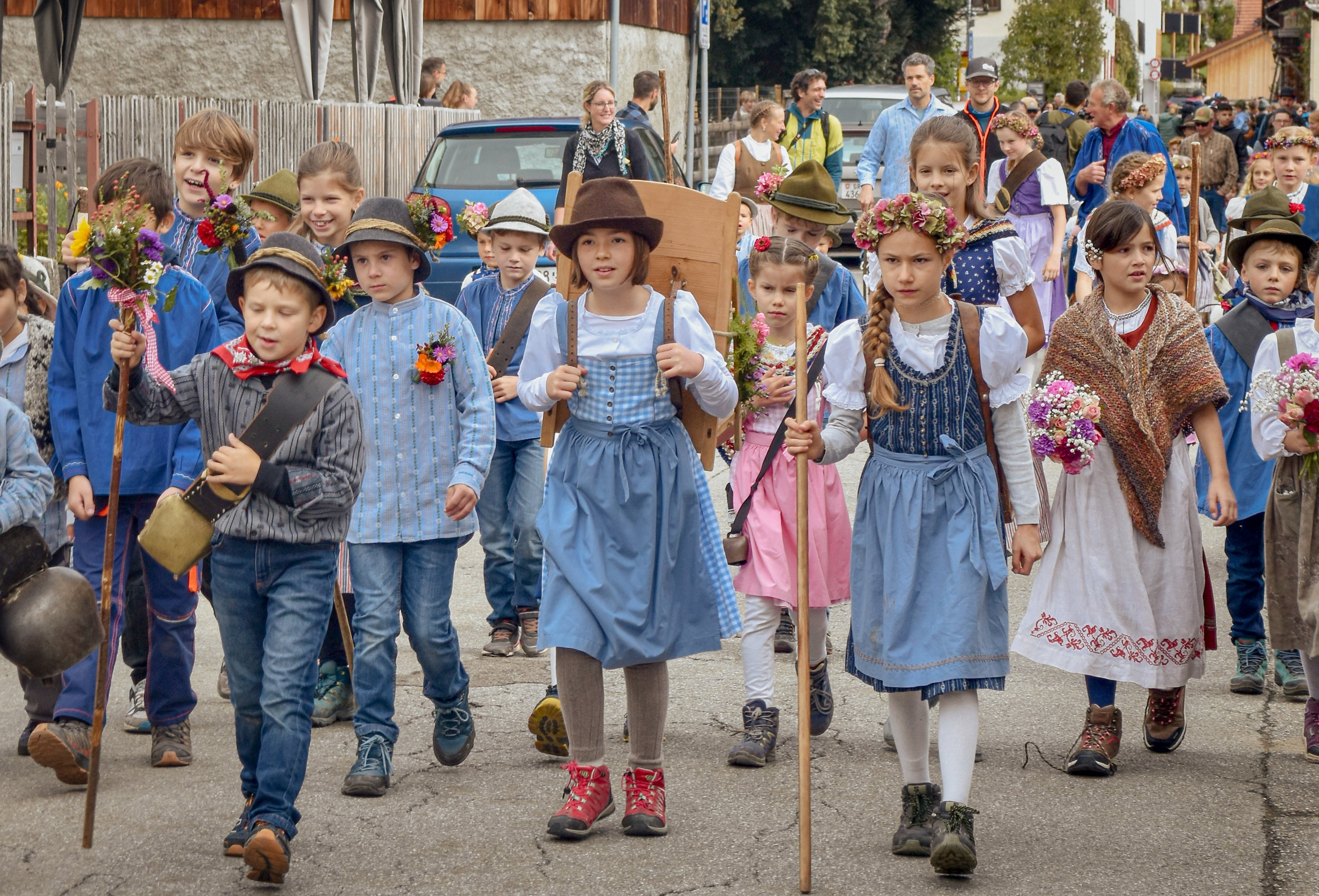Children have their own procession during the end-of-summer Alp Spektakel, in the Swiss Alpine village of Seewis im Prättigau. Photo: Victoria Burrrows