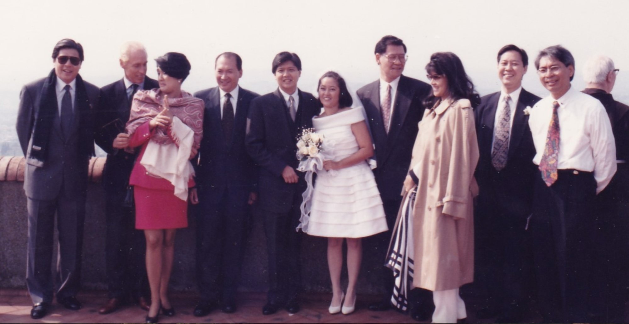 Ferdinand Marcos Jnr and his wife Liza (centre) with relatives and friends outside the church on their wedding day in 1993. Photo: Flickr/bongbongmarcos