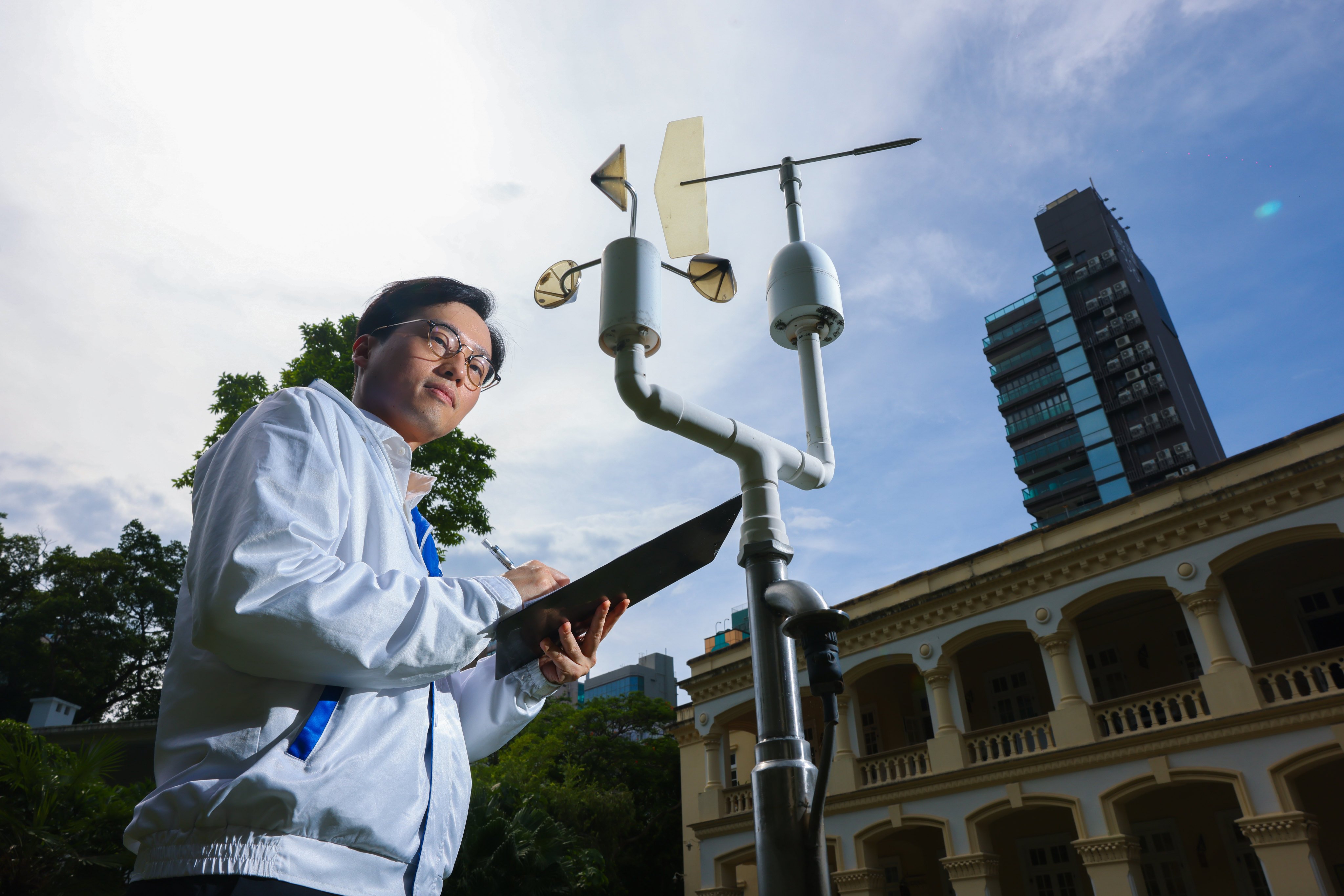 Scientific officer Lo Ka takes readings at the Hong Kong Observatory in Tsim Sha Tsui. Photo: Nora Tam