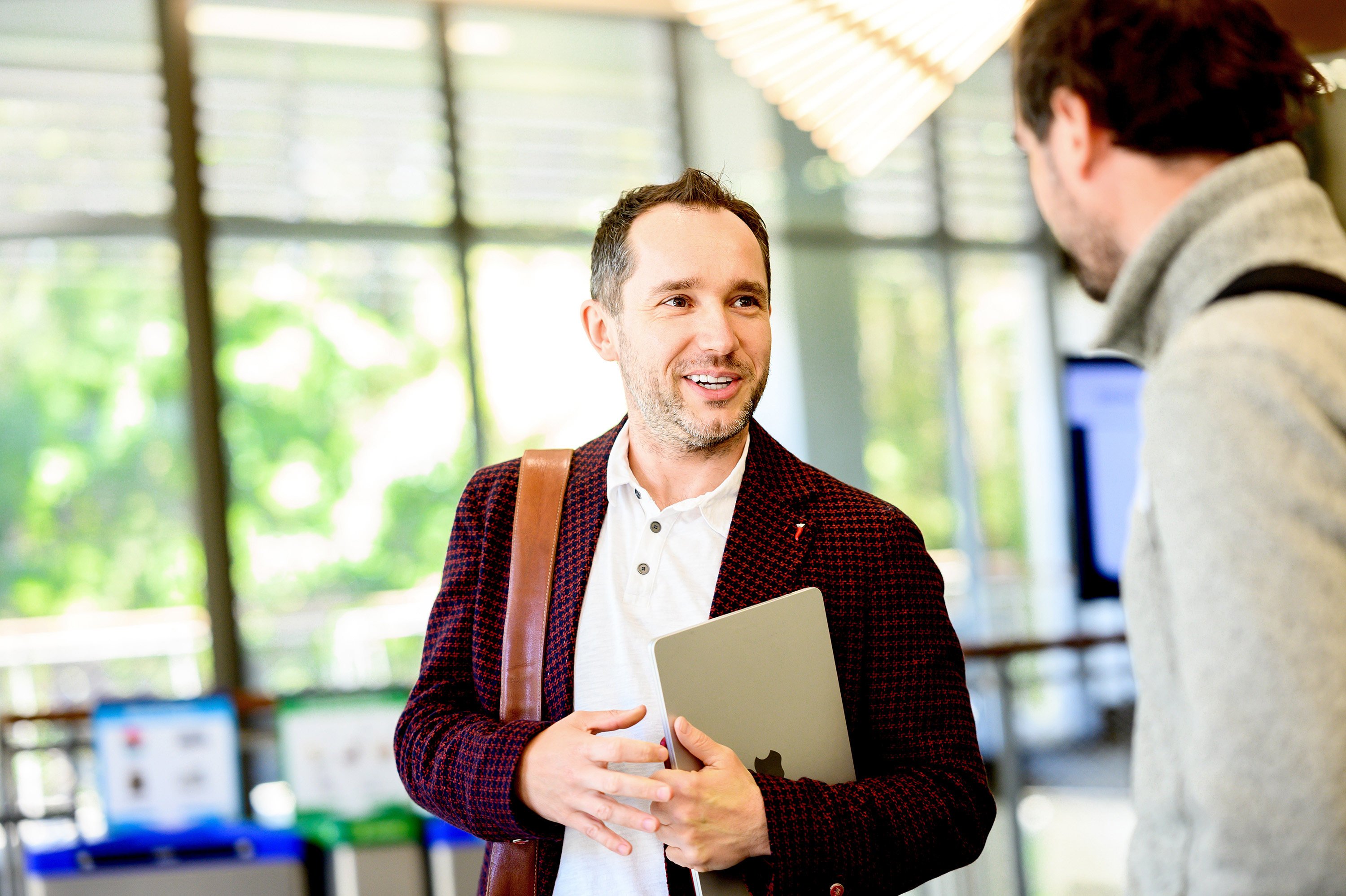 Professor Przemyslaw Jeziorski speaks to a student in 2023. 
Photo: UC Berkeley via TNS