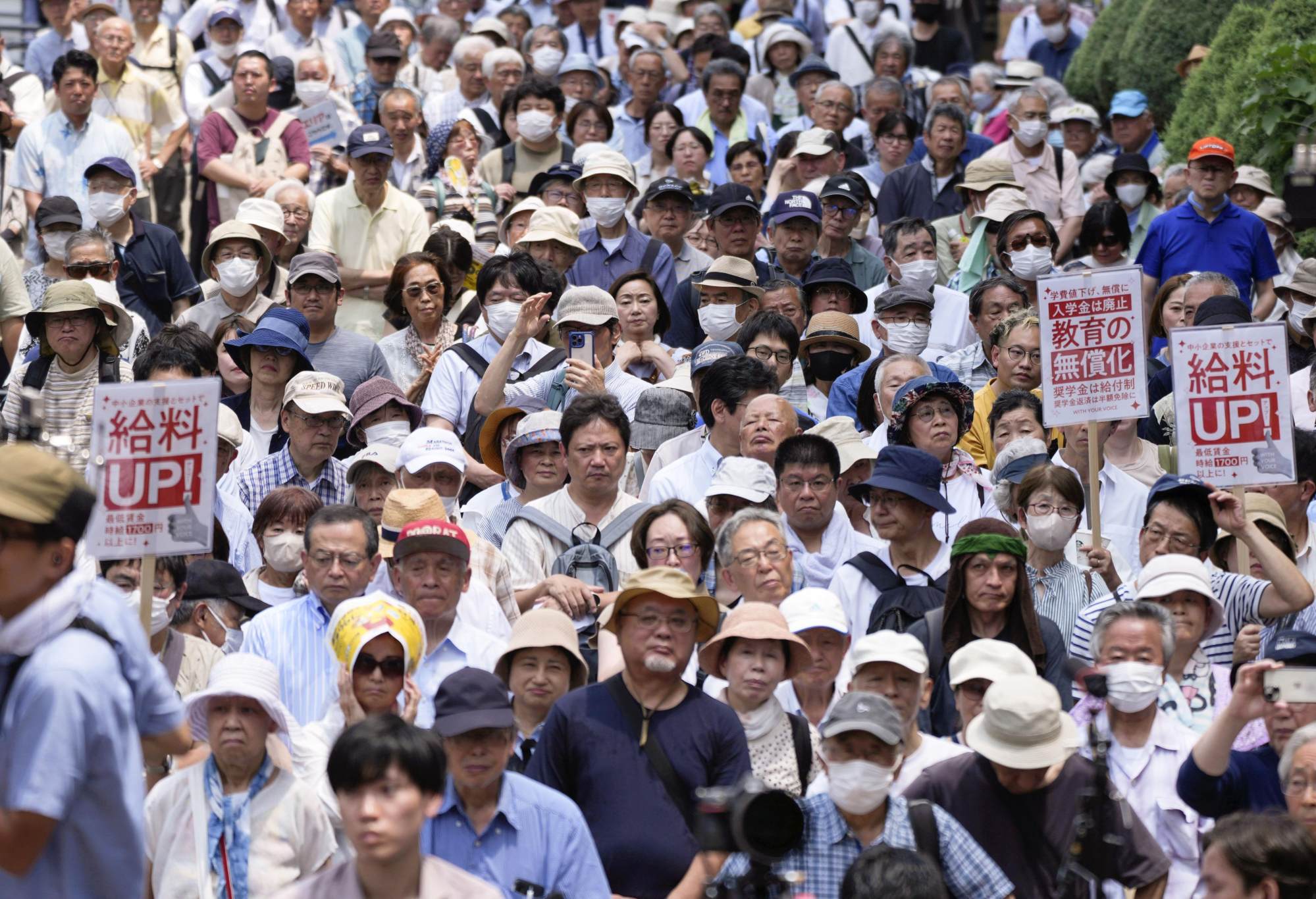 People listen to a stump speech in Tokyo’s Ikebukuro area on July 3, as official campaigning begins for the July 20 House of Councillors election. Photo: Kyodo People listen to a stump speech in Tokyo’s Ikebukuro area on July 3, as official campaigning begins for the July 20 House of Councillors election. Photo: Kyodo