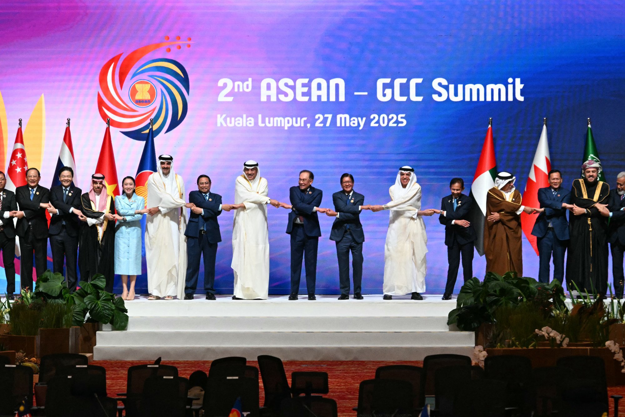 Asean and Gulf officials join hands for a group photo at the second Asean-GCC Summit in Kuala Lumpur on May 27. Photo: AFP Asean and Gulf officials join hands for a group photo at the second Asean-GCC Summit in Kuala Lumpur on May 27. Photo: AFP