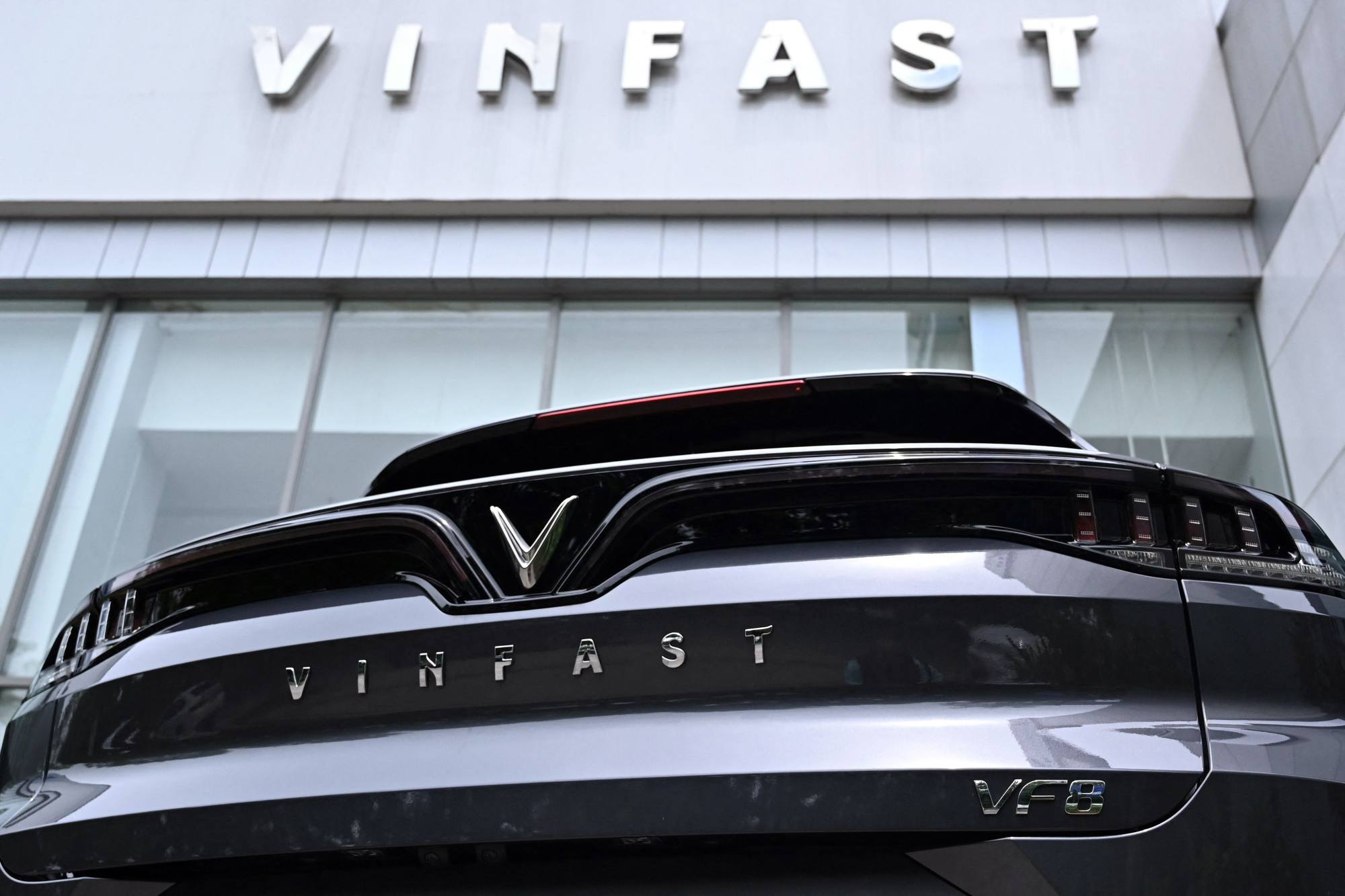 A Vinfast electric car is seen parked outside a showroom in Hanoi. Photo: AFP A Vinfast electric car is seen parked outside a showroom in Hanoi. Photo: AFP