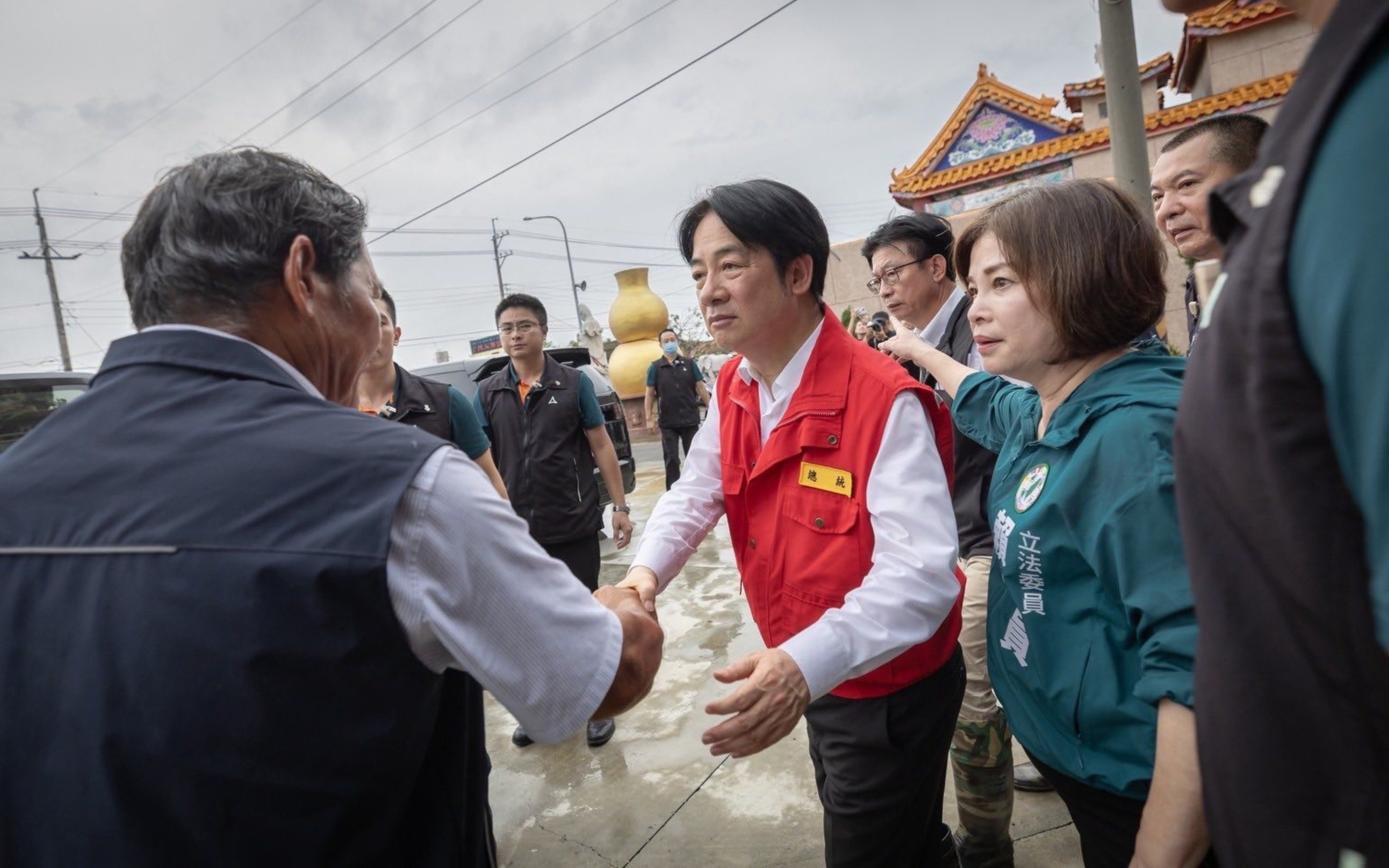 William Lai visits Tainan after it was battered by Typhoon Danas in early July. His response was criticised as “tone-deaf”. Photo: Handout
