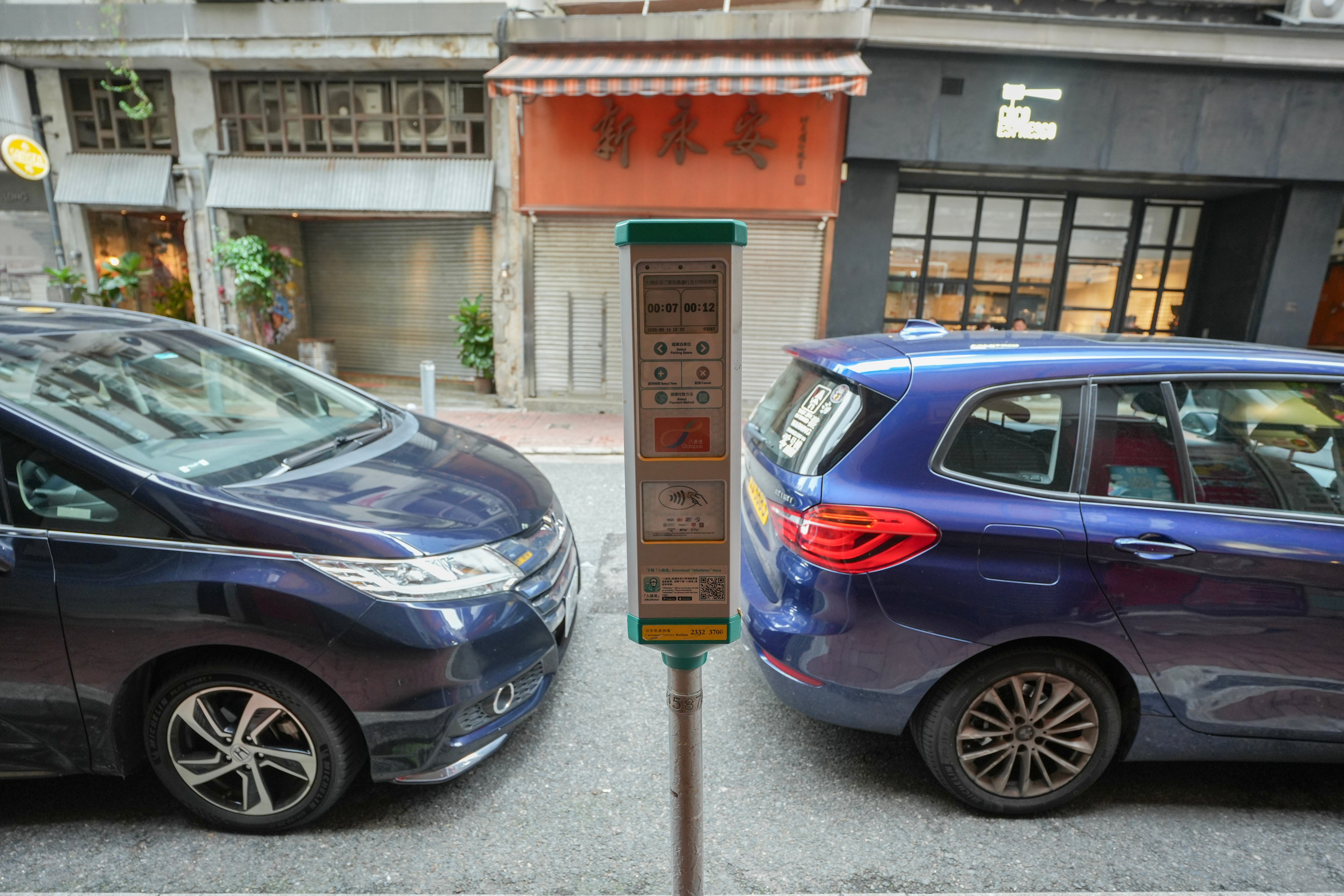Cars parked along the street in metered bays in Sheung Wan on June 15. Photo: Sun Yeung