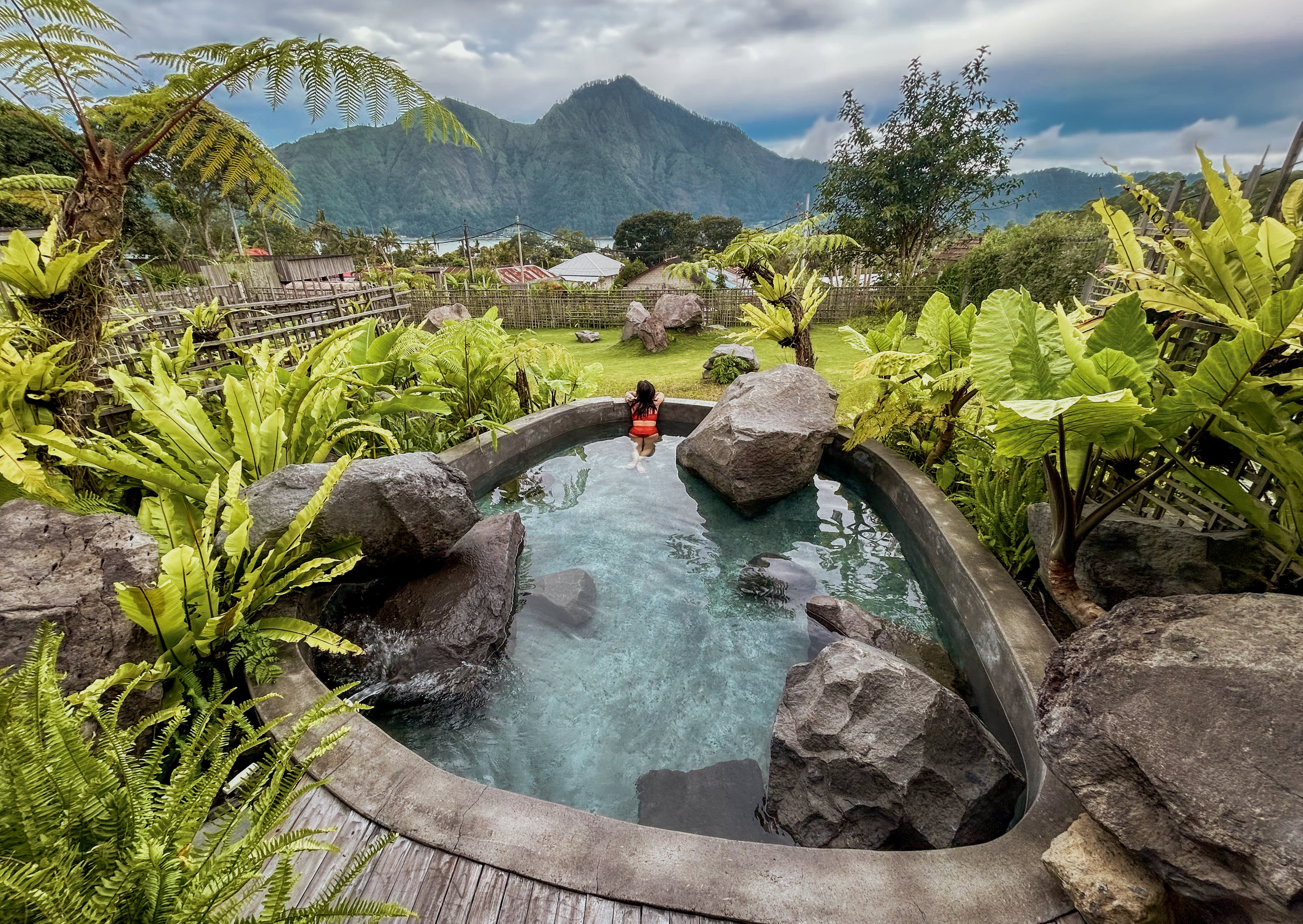 A private hot-spring jacuzzi at Onsen Bali, overlooking Lake Batur, Bali. Photo: Ian Neubauer
