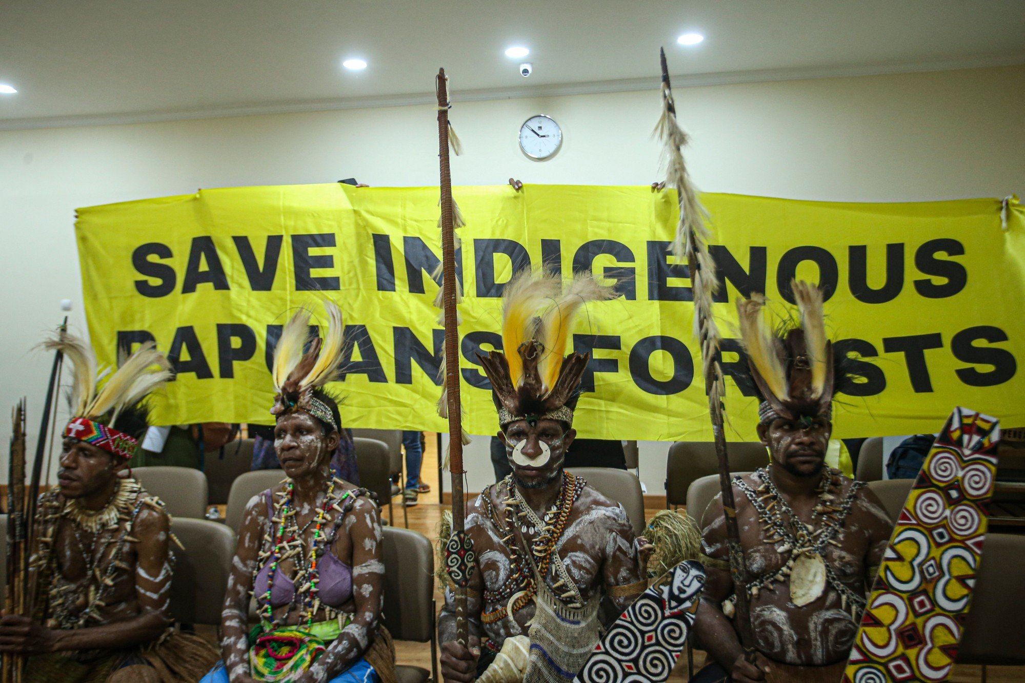 The Awyu tribe from Papua at an office in Jakarta calling for protection of the region’s rainforests, which have come under threat from palm oil projects. Photo: Shutterstock