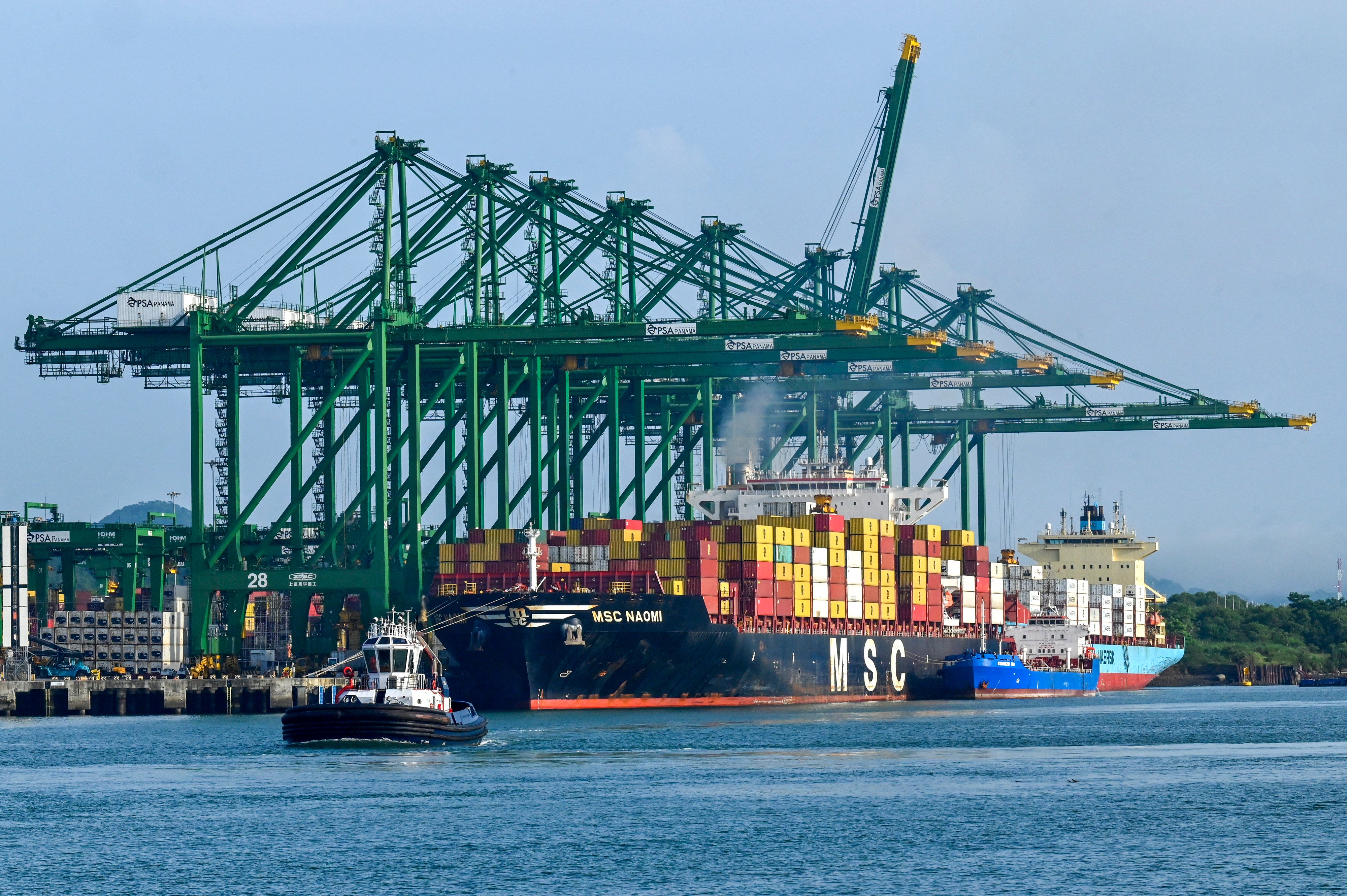 A ship is loaded with containers at the Panama Canal port of Balboa in June, 2023. Photo: AFP