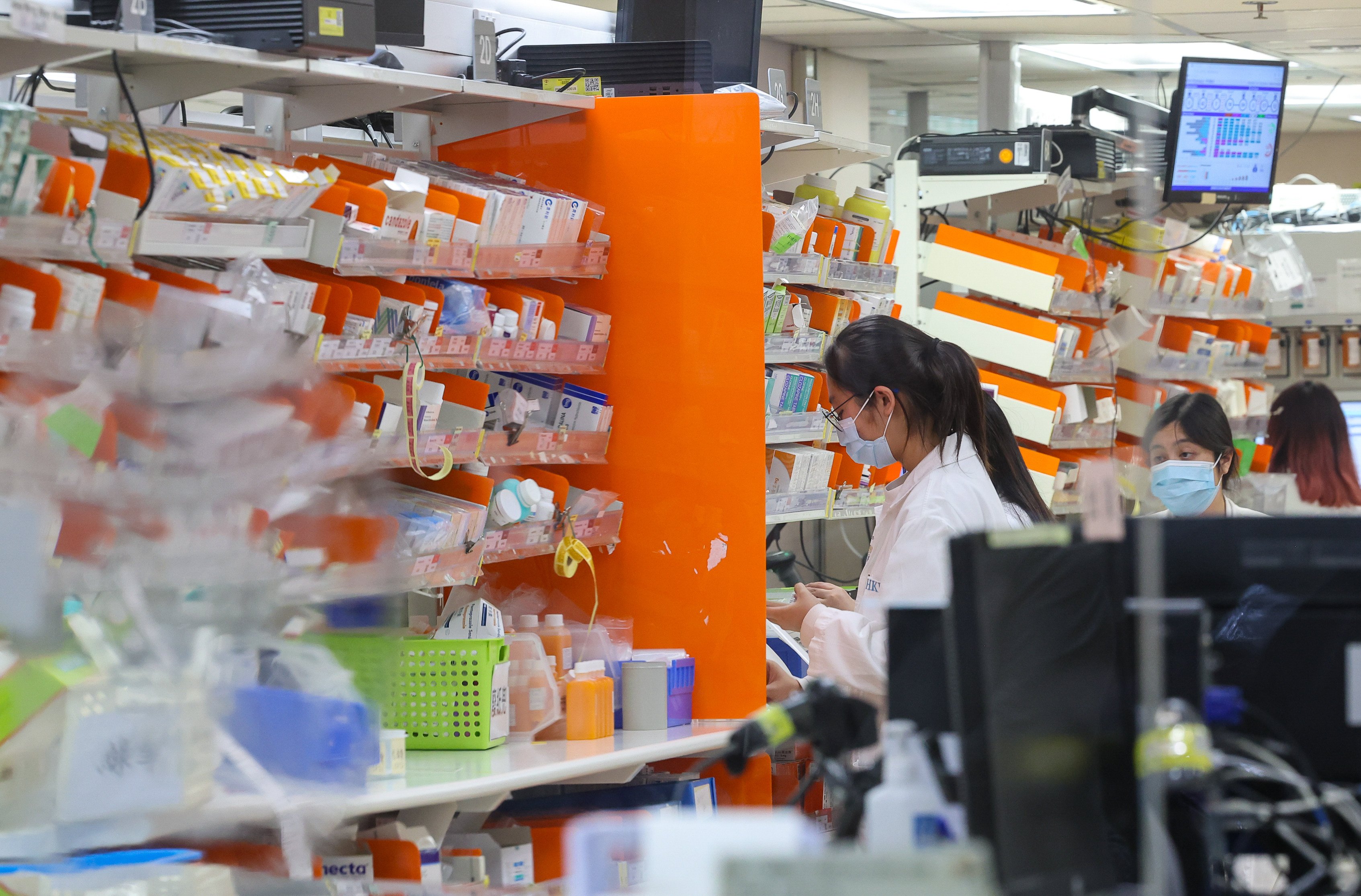 Staff at the pharmacy in Pamela Youde Nethersole Eastern Hospital in Chai Wan. Photo: Edmond So