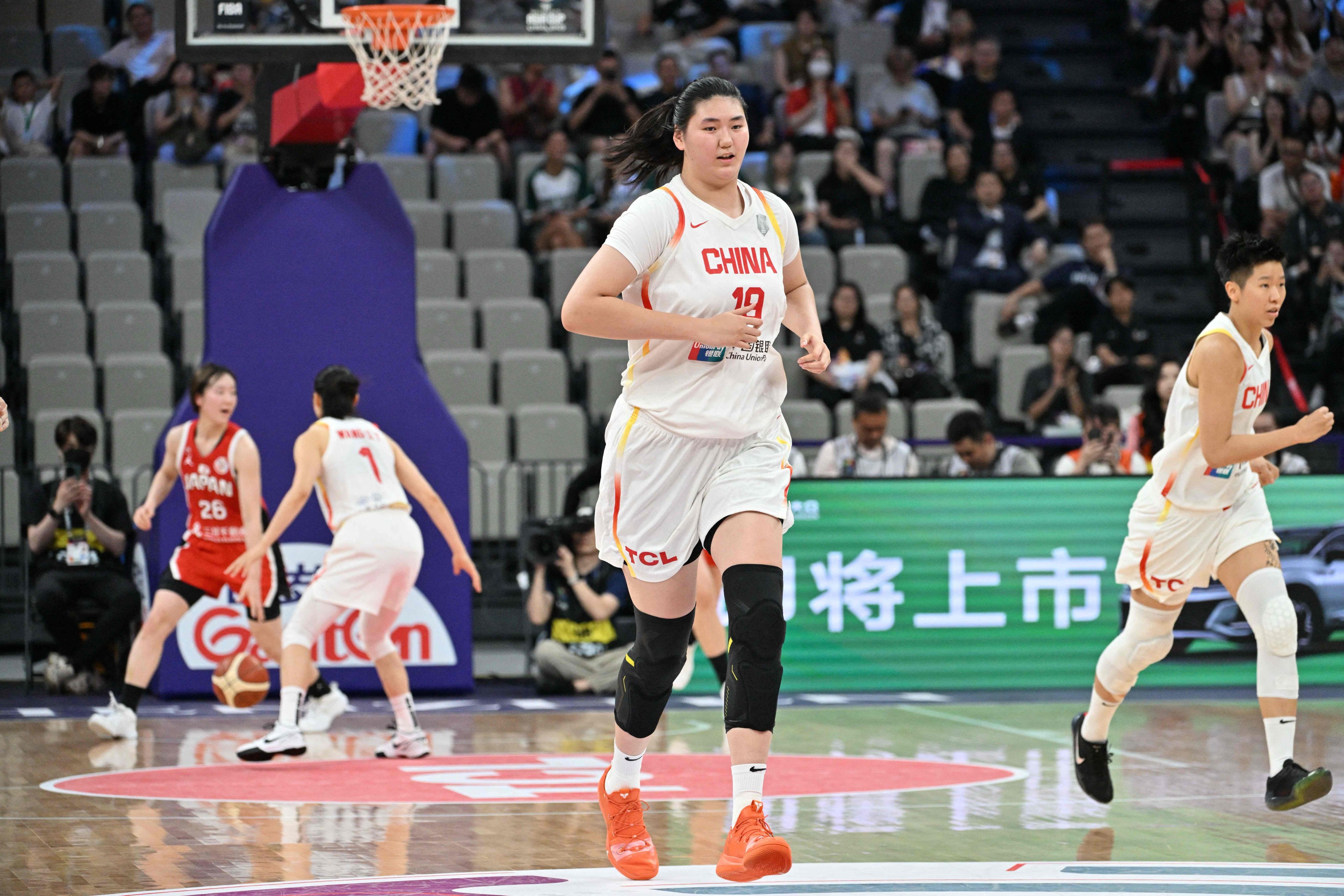 China’s Zhang Ziyu heads back down the court during her side’s semi-final against Japan in Shenzhen. Photo: AFP