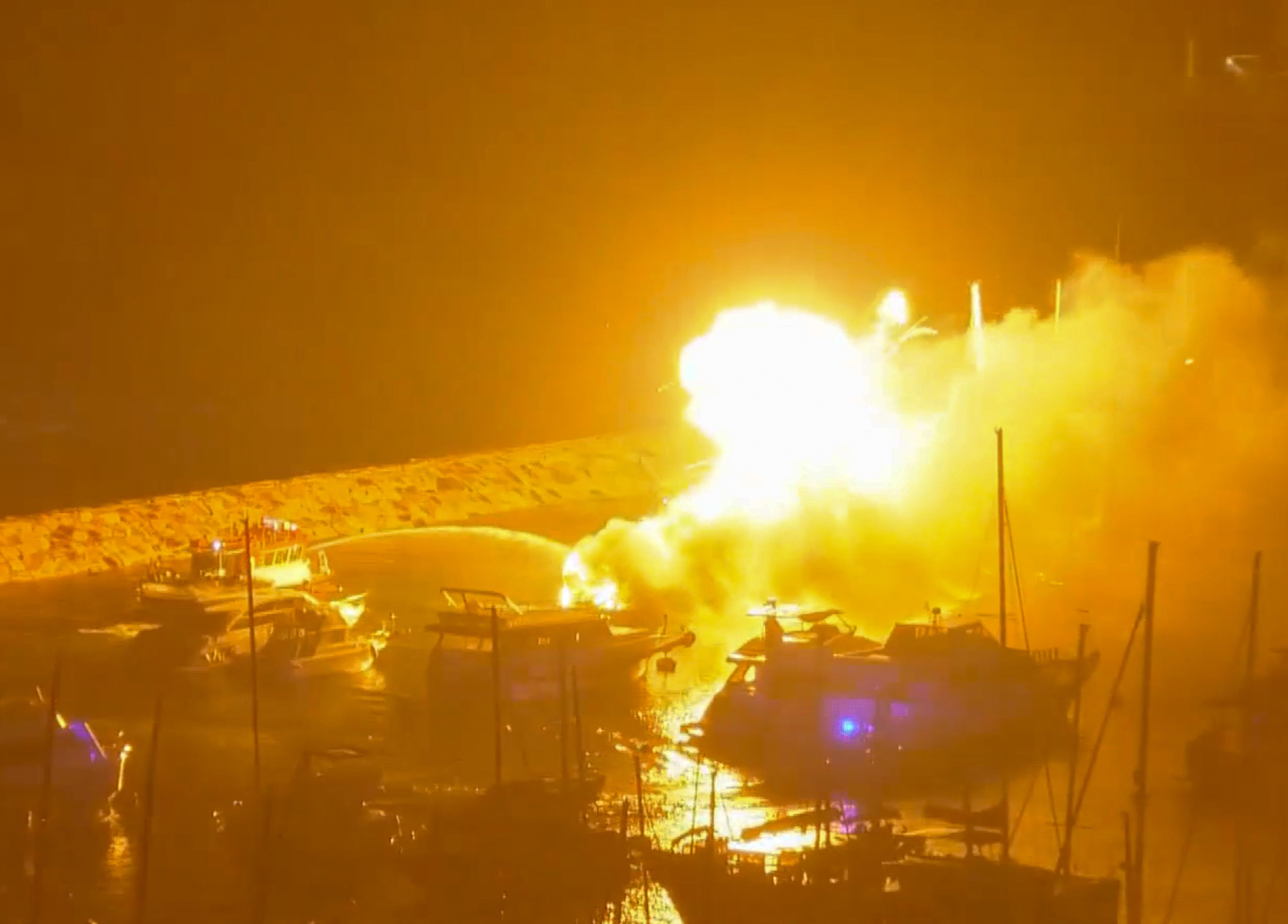The fire started in a speedboat and spread to two other boats. Photo: Cable TV News