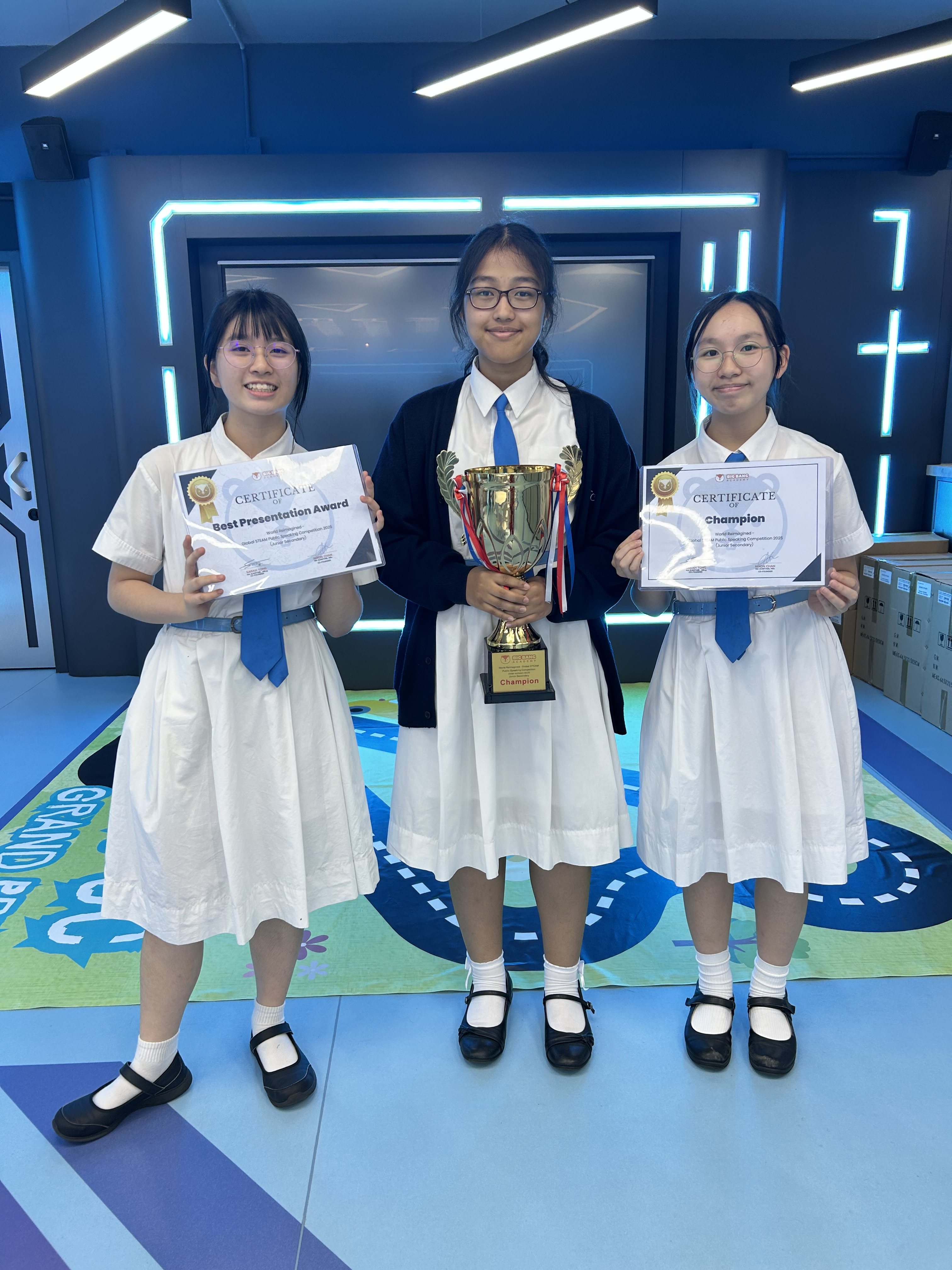 Kally Yu Ying-tong (left), Aaravee Rajya Laxmi Rana (centre) and Kaitlynn Ng Hei-tung (right) from St Francis’ Canossian College won the Best Presentation award at World Reimagined, a STEAM competition for public speaking. Photo: Handout