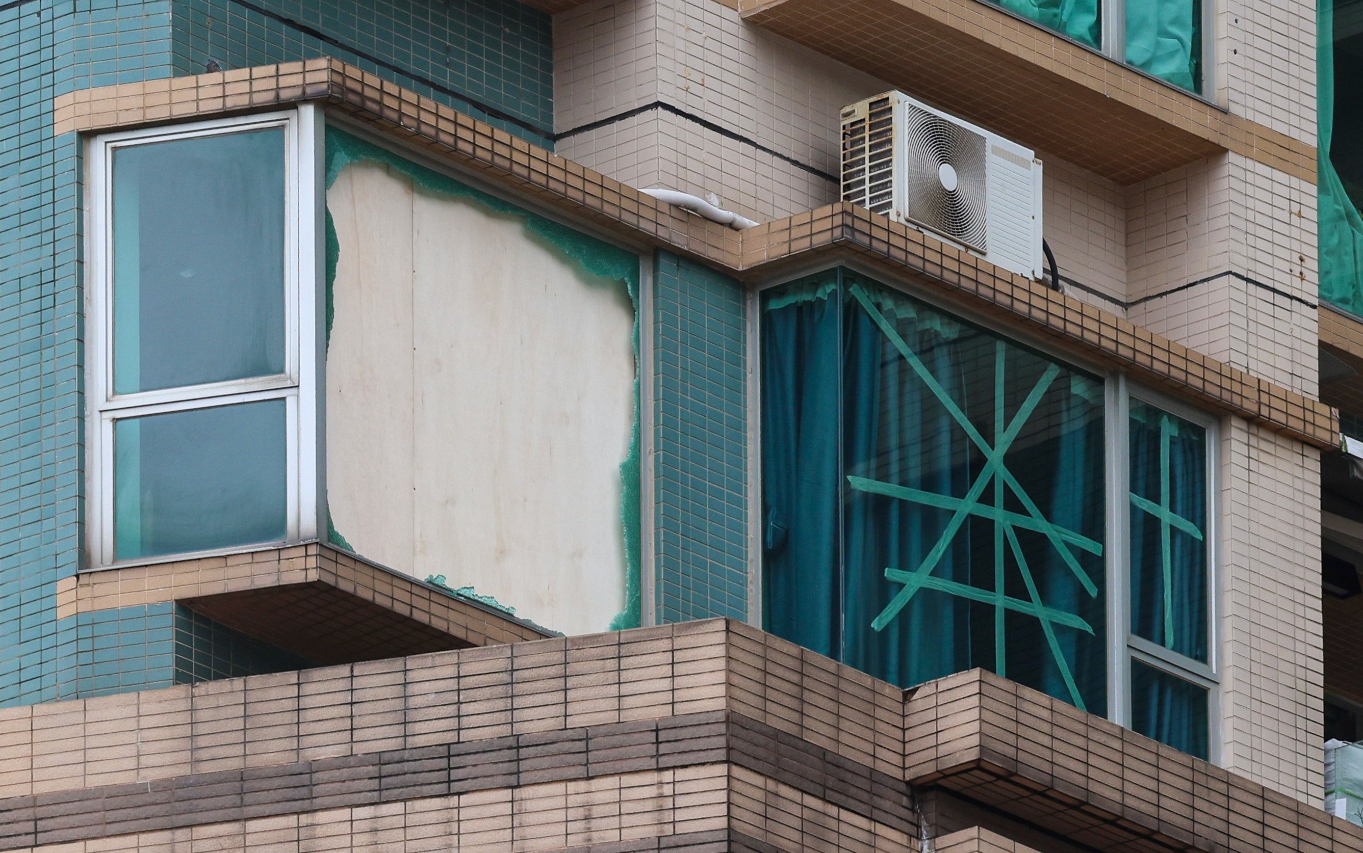 A Cheung Sha Wan flat was among properties that had their windows damaged when Typhoon Wipha struck the city on Sunday. Photo: Jelly Tse