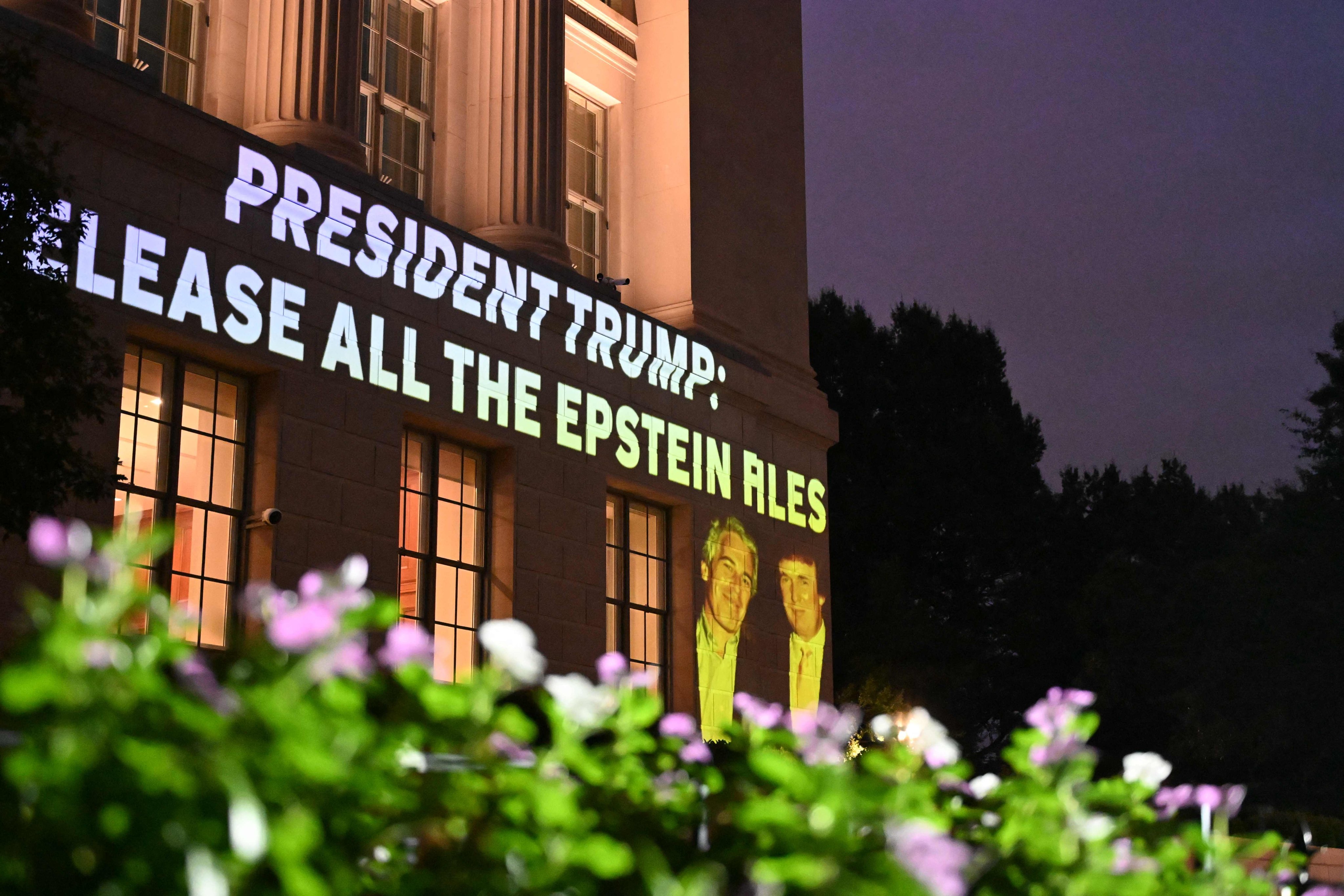 A message calling on US President Donald Trump to release all files related to Jeffrey Epstein is projected onto the US Chamber of Commerce building across from the White House in Washington, DC, on July 18. Photo: AFP