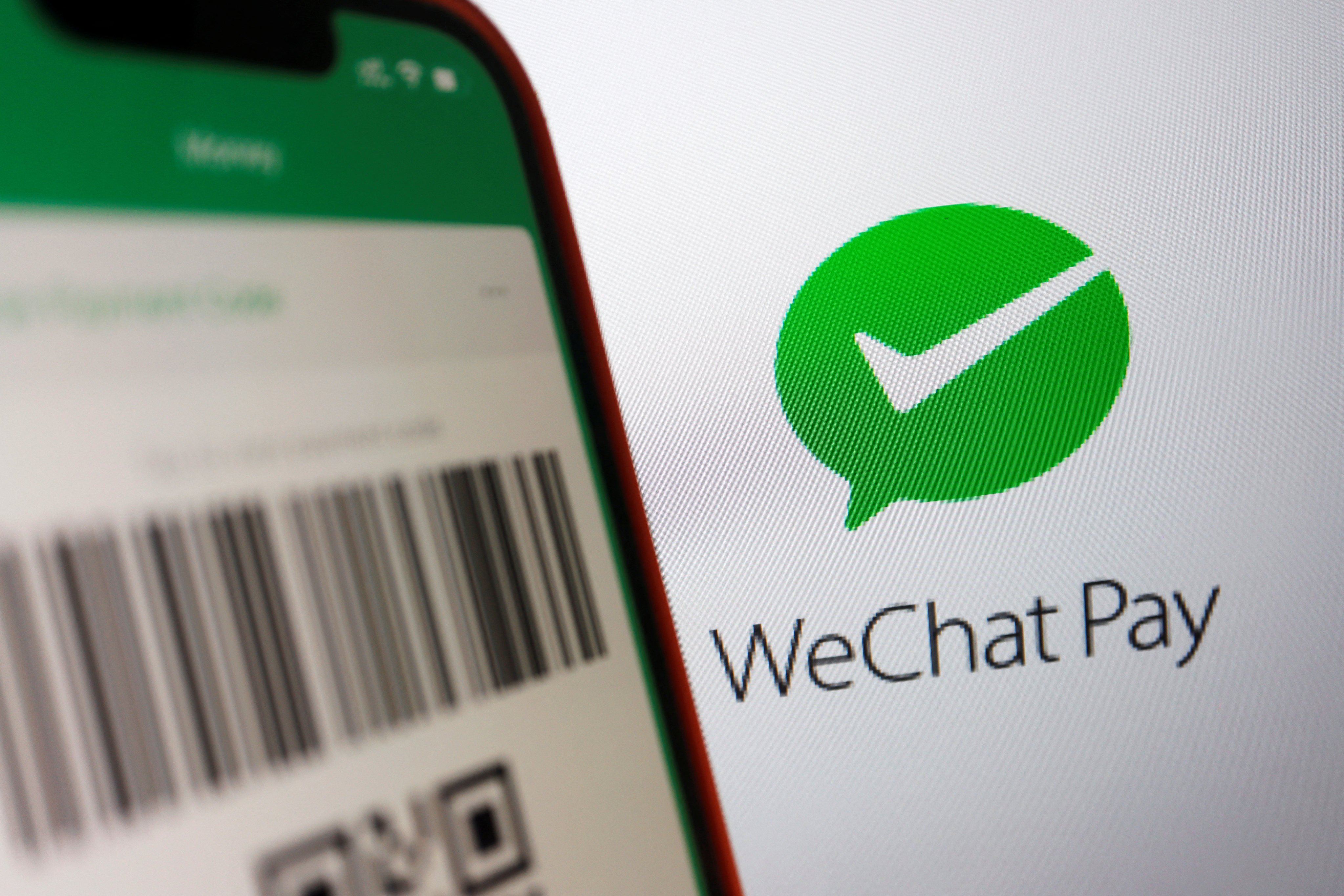 The WeChat Pay logo is displayed next to a QR payment code in this illustration picture taken June 28, 2023. Photo: Reuters