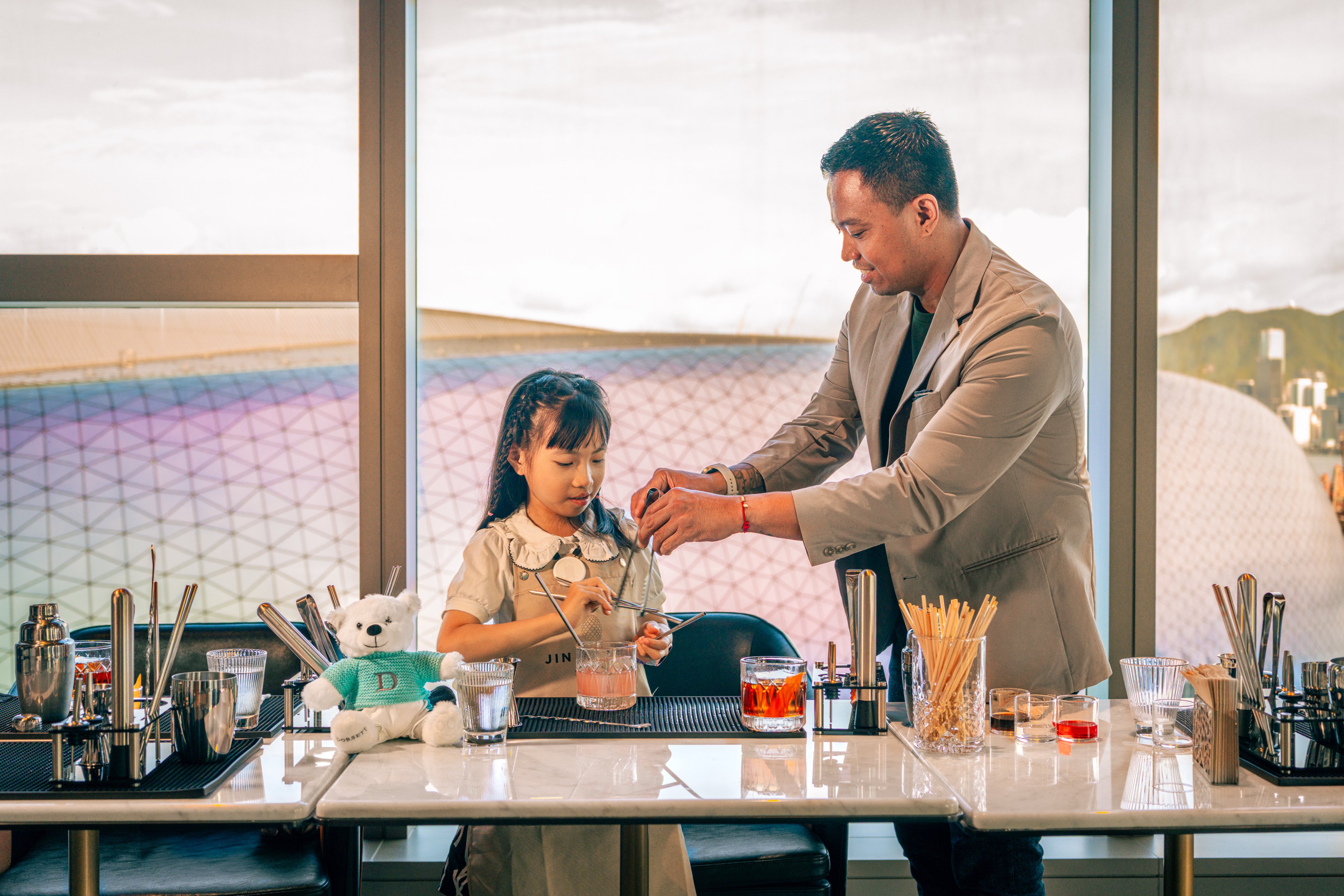The Dorsett  Kai  Tak offers a mocktail-making class at Jin Bo Law Skybar, where both kids and adults can create fun drinks together