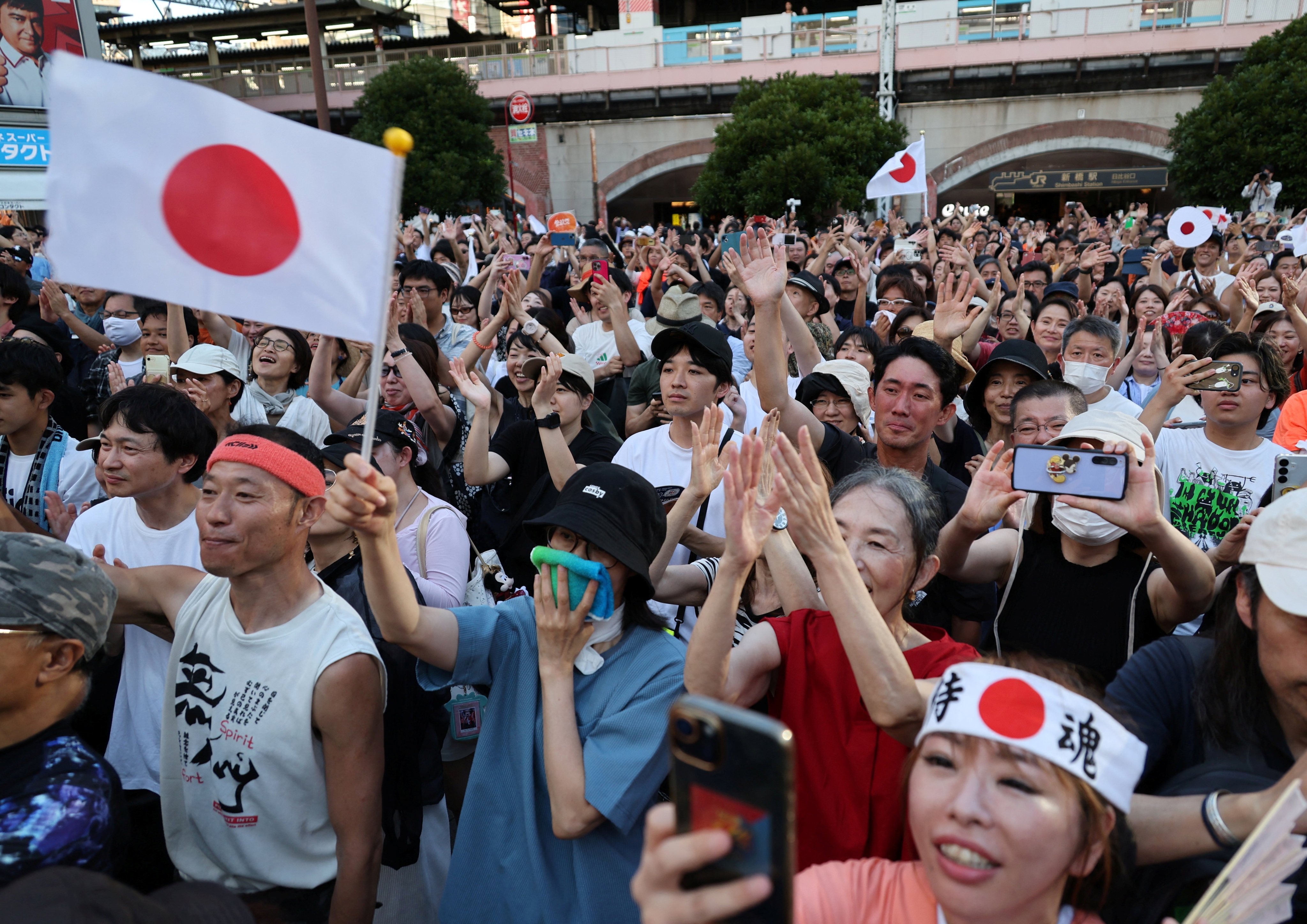 Supporters of Japan’s Sanseito party attend a rally in Tokyo on July 21. Photo: Reuters