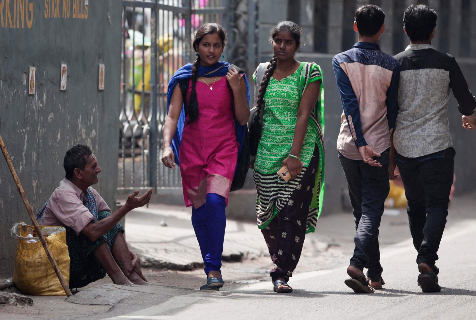 An Indian man seeks alms on a street in Hyderabad, India. Photo: AP