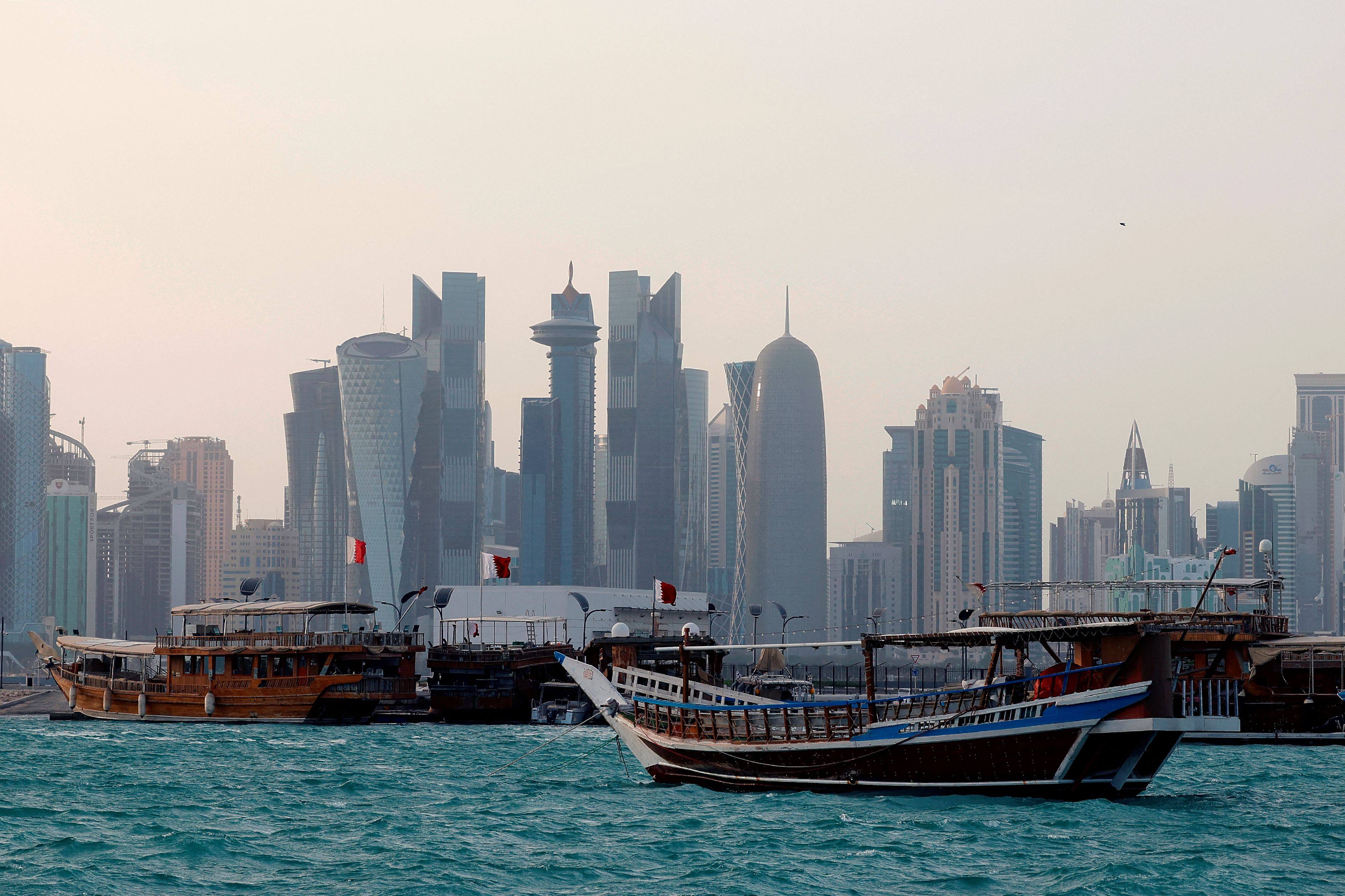 Traditional dhow boats anchored in front of the Doha skyline. Qatar has made an official bid to host the 2036 Olympics. Photo: AFP