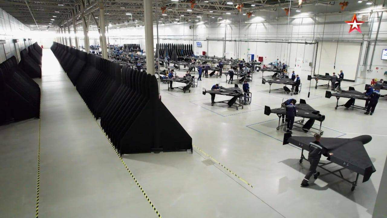 Zvezda TV video showed workers with their faces blurred assembling jet-black triangle-shaped attack drones. Photo: x.com/NOELreports