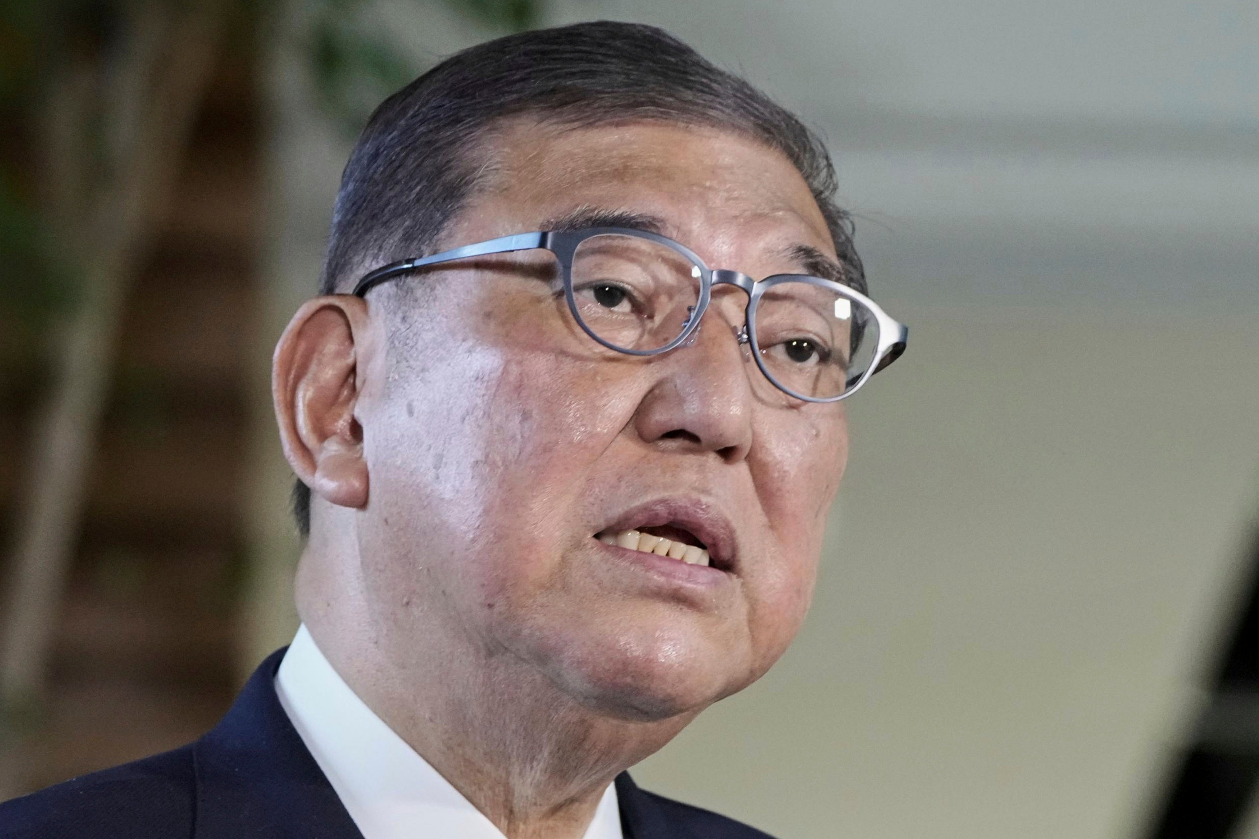 Japanese Prime Minister Shigeru Ishiba speaks to the media at the prime minister’s office in Tokyo on Wednesday. Photo: Kyodo / AP