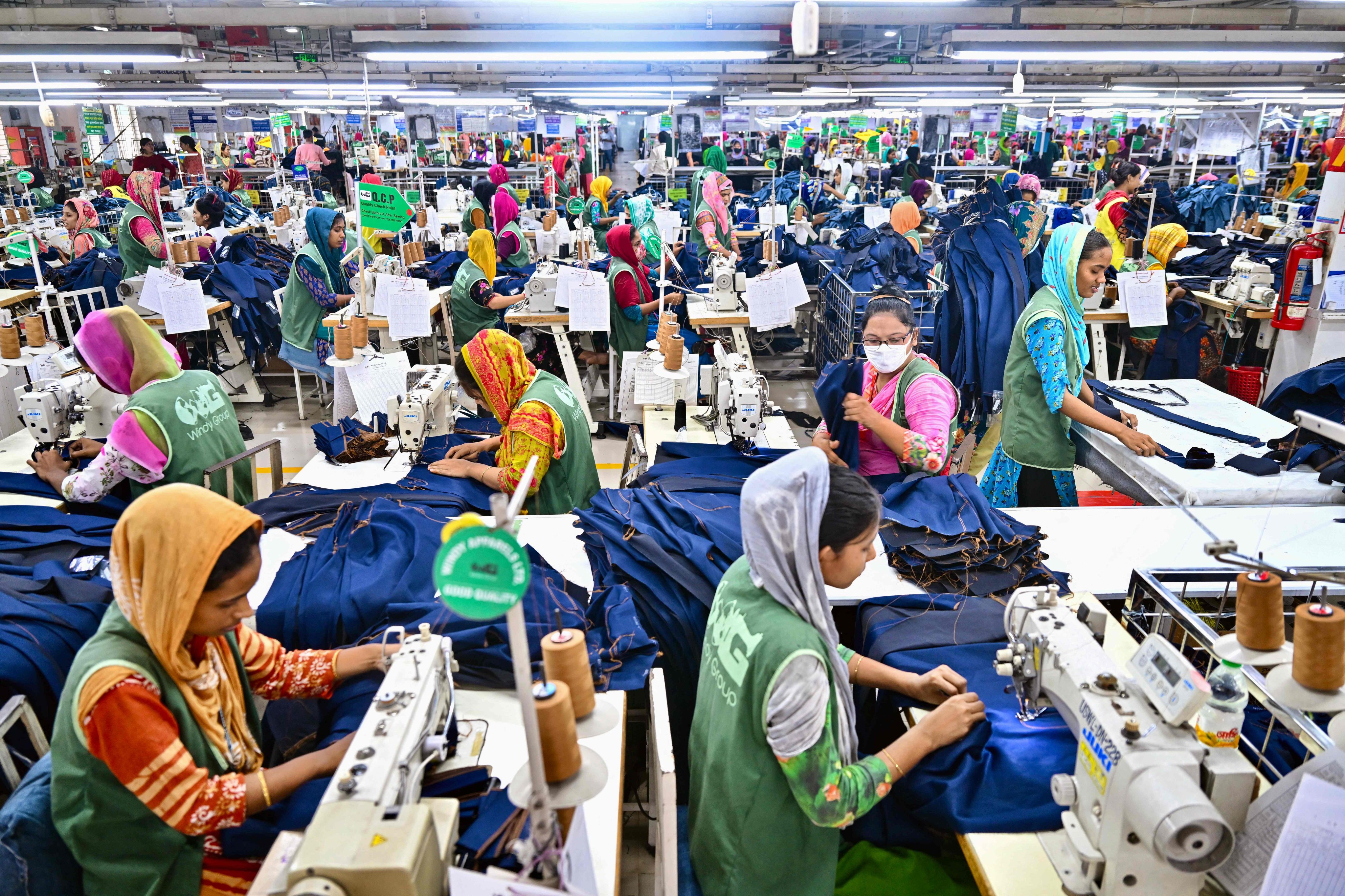 Garment workers at a garment factory on the outskirts of Dhaka. Bangladesh is the world’s second-biggest garment maker. Photo: AFP
