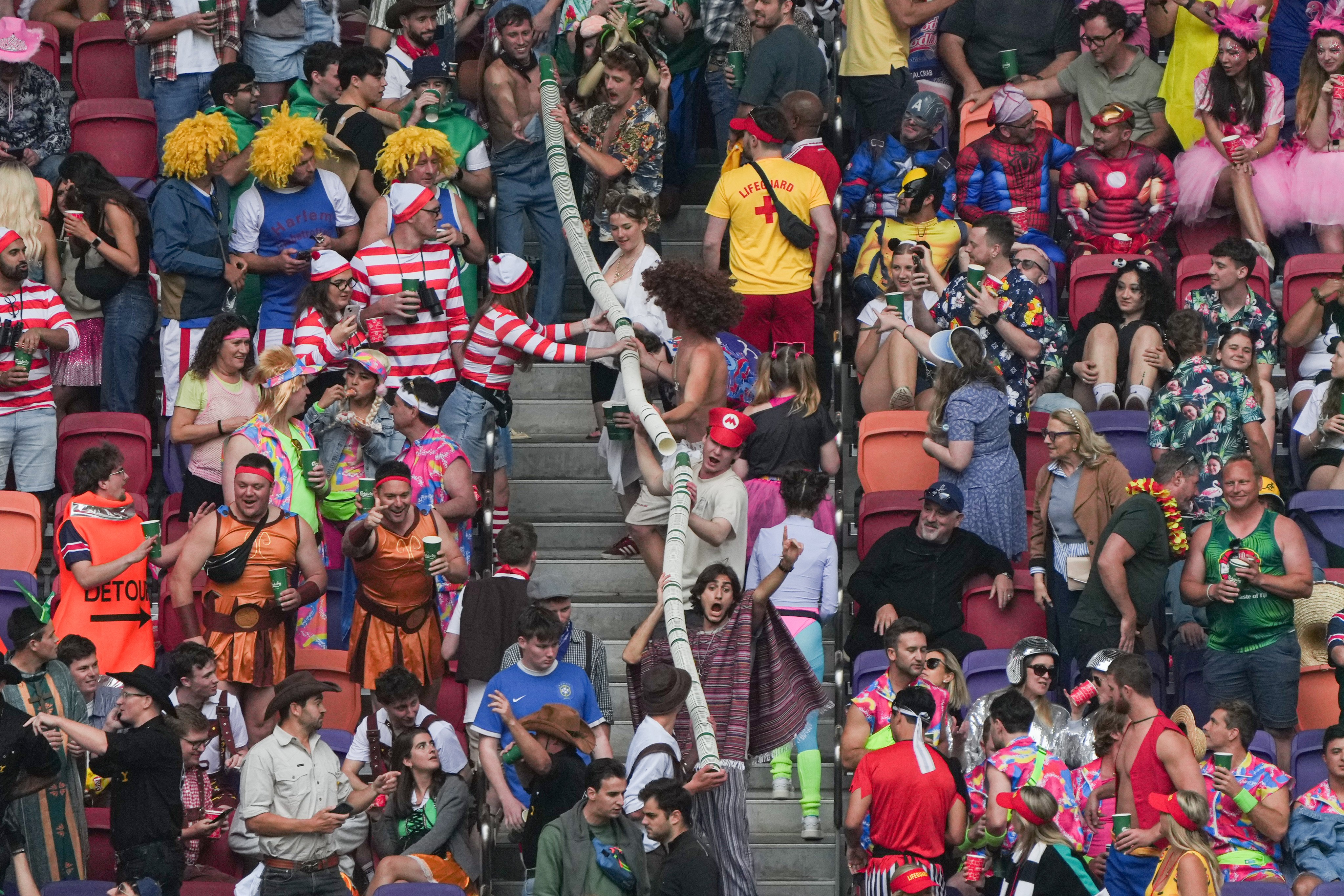 Fans stack paper cups in the stands of Kai Tak Stadium on the second day of the Hong Kong Sevens in March. Eugene Lee