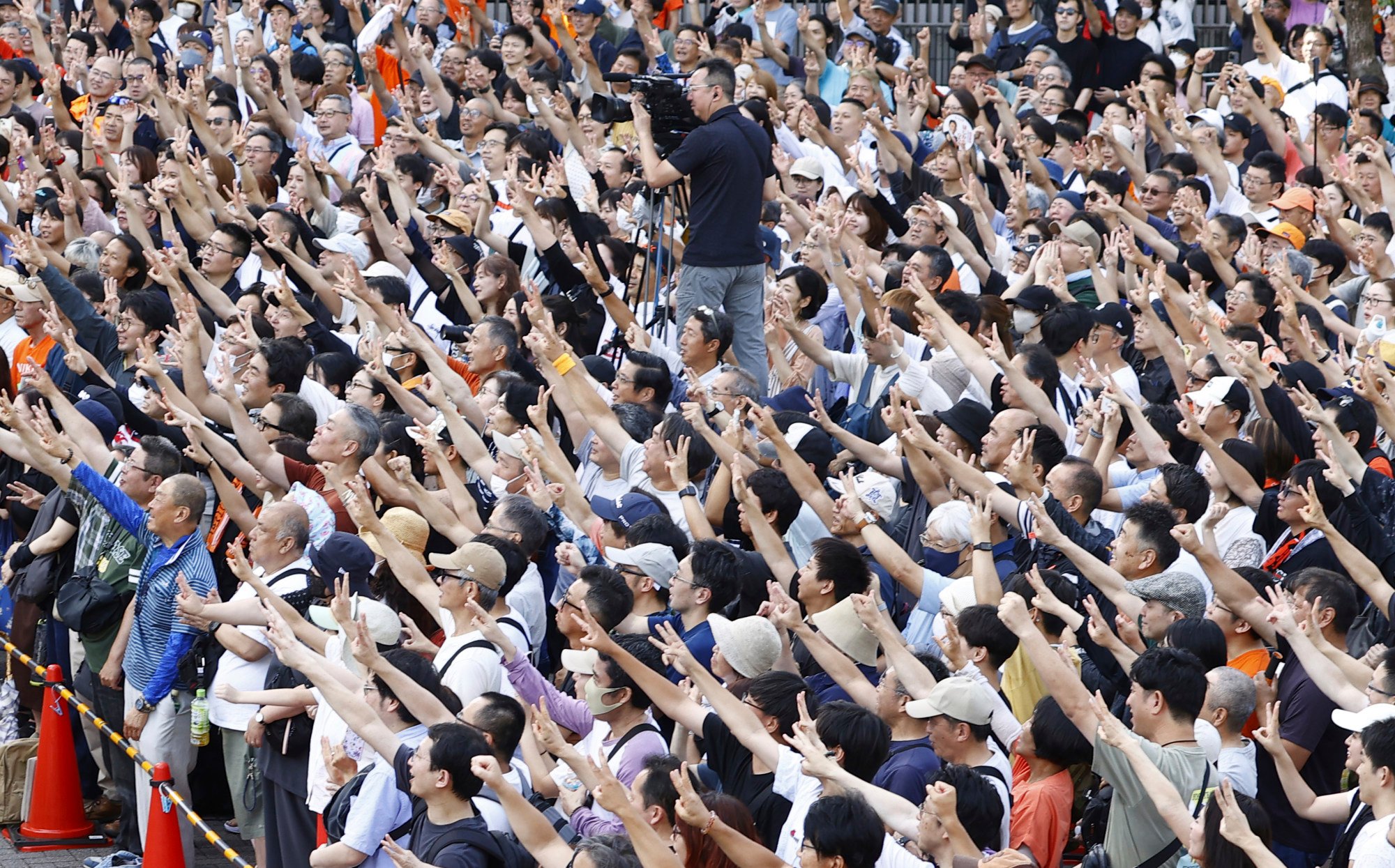 Supporters gather at a pre-election rally for the Sanseito party in Yokohama on Saturday. Photo: Kyodo News via AP