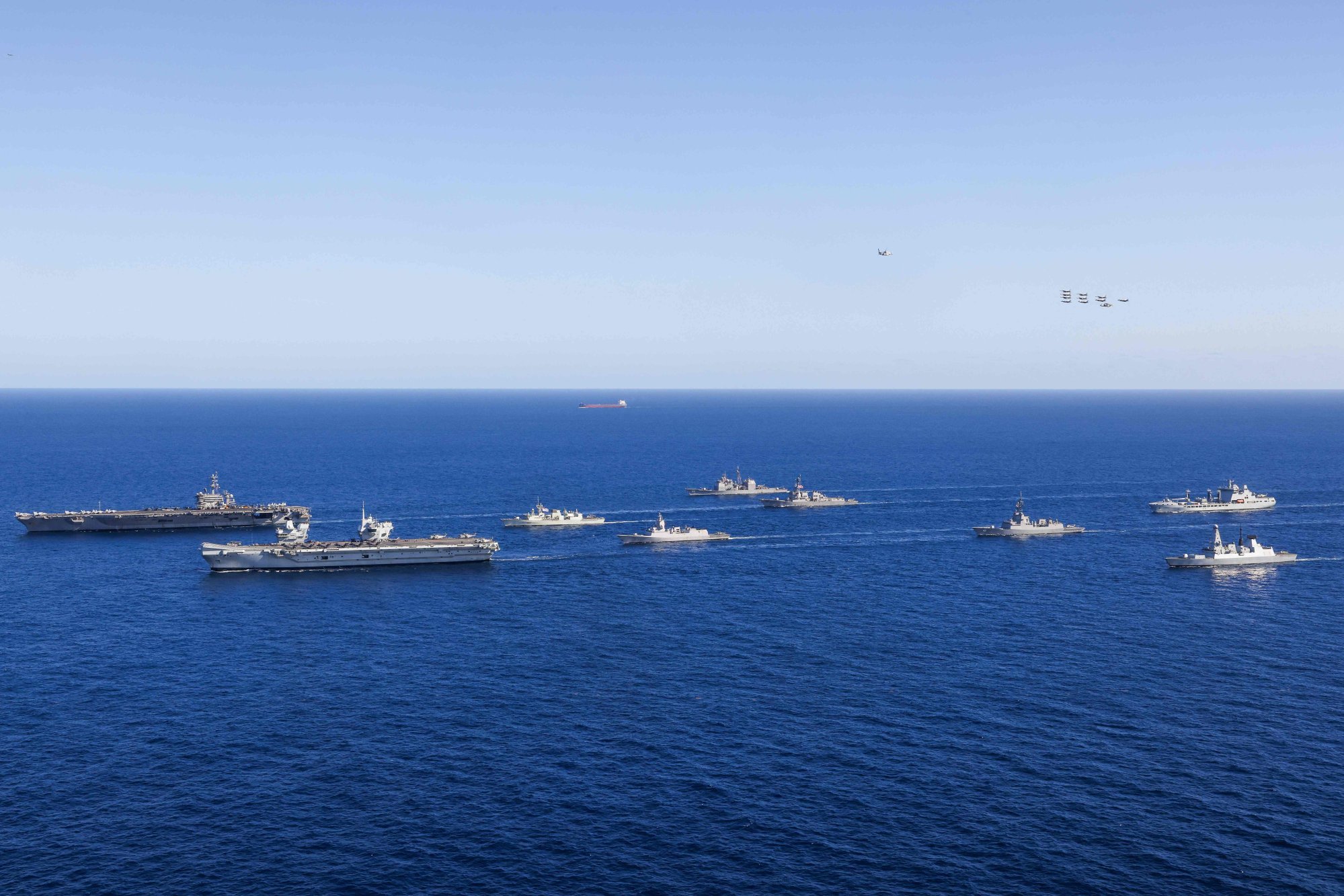 US, British, Canadian, Norwegian and Australian warships and aircraft carriers sail in formation off the coast of Australia last week as part of Talisman Sabre 2025. Photo: UK Defence Ministry/AFP