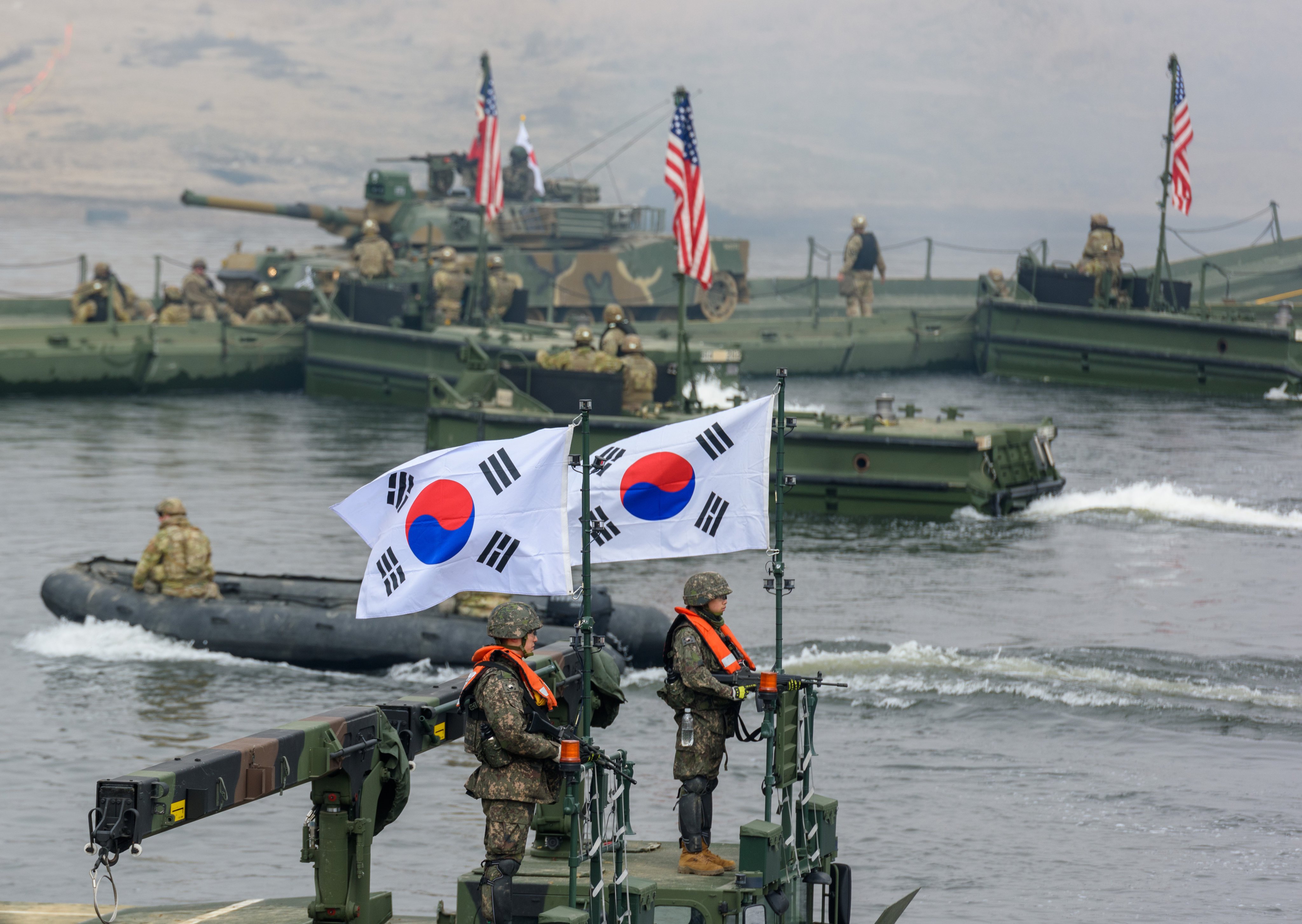 US and South Korean army soldiers participate in a joint river-crossing exercise in the Imjin River near the border town of Yeoncheon. Photo: SOPA Images/LightRocket/Getty Images