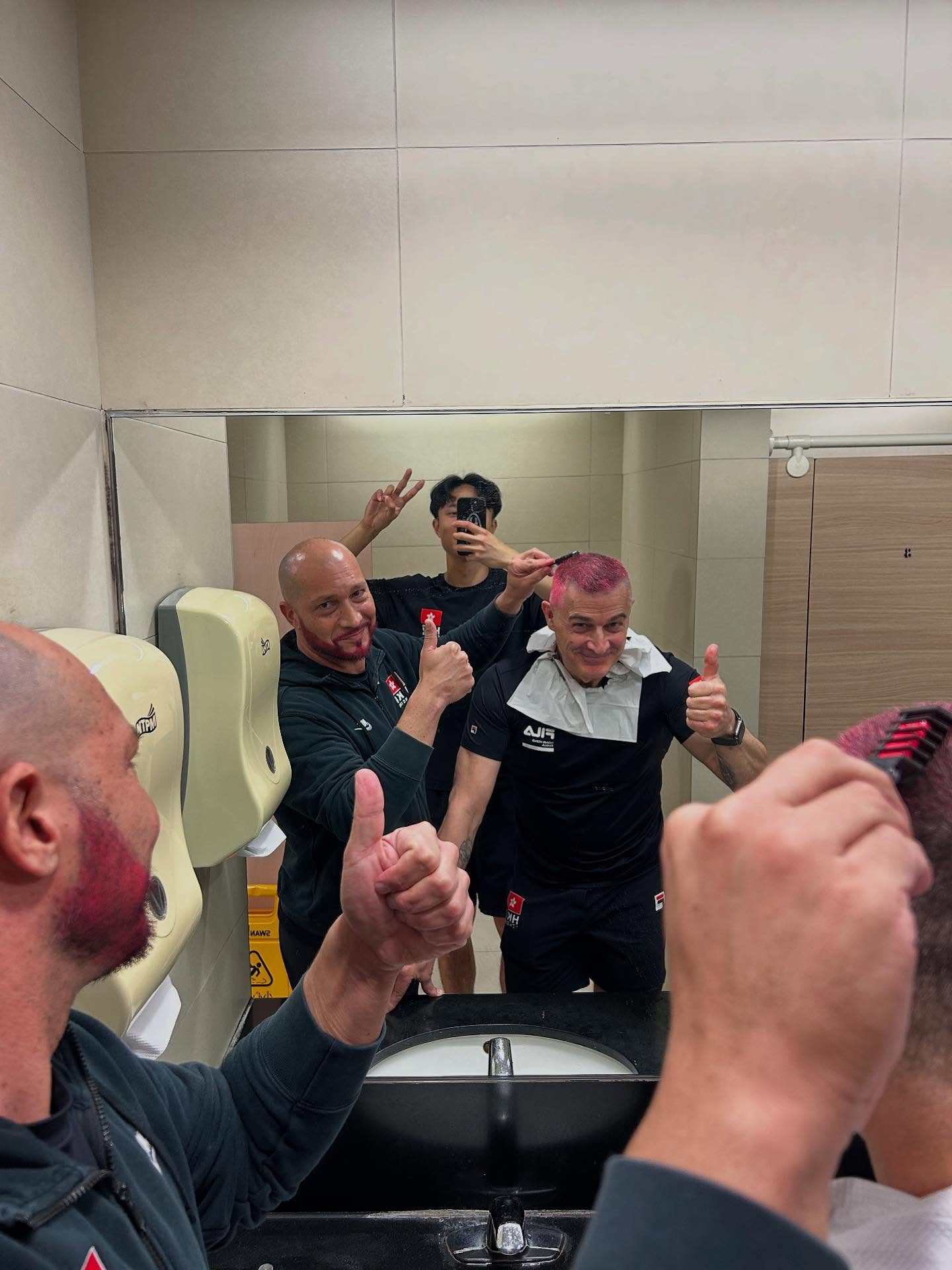 Ryan Choi (middle) with his Italian coaches Maurizio Zomparelli (right) and Giacomo Fanizza after they had to dye their hair and beard pink after Choi’s win at the Shanghai Grand Prix in May. Photo: Instagram/@ryanchoiiiii