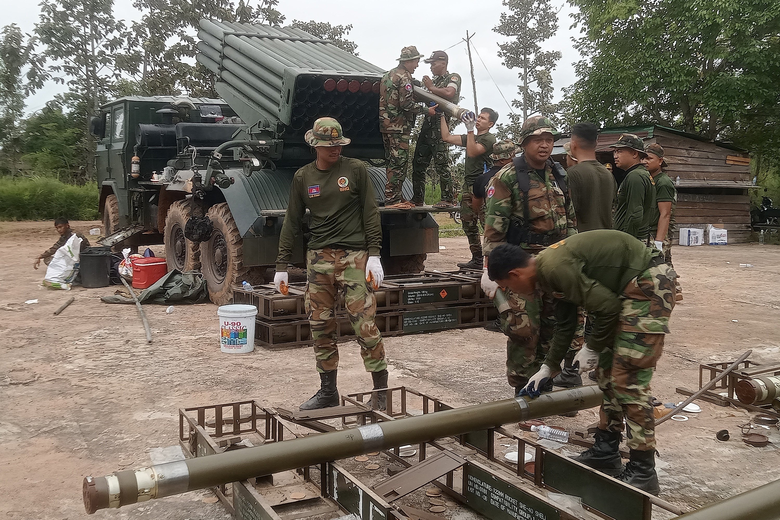 Cambodian soldiers reload the BM-21 multiple rocket launcher in Preah Vihear province on Thursday. At least 12 people have been killed in recent fighting between Thai and Cambodian troops along their border. Photo: TNS