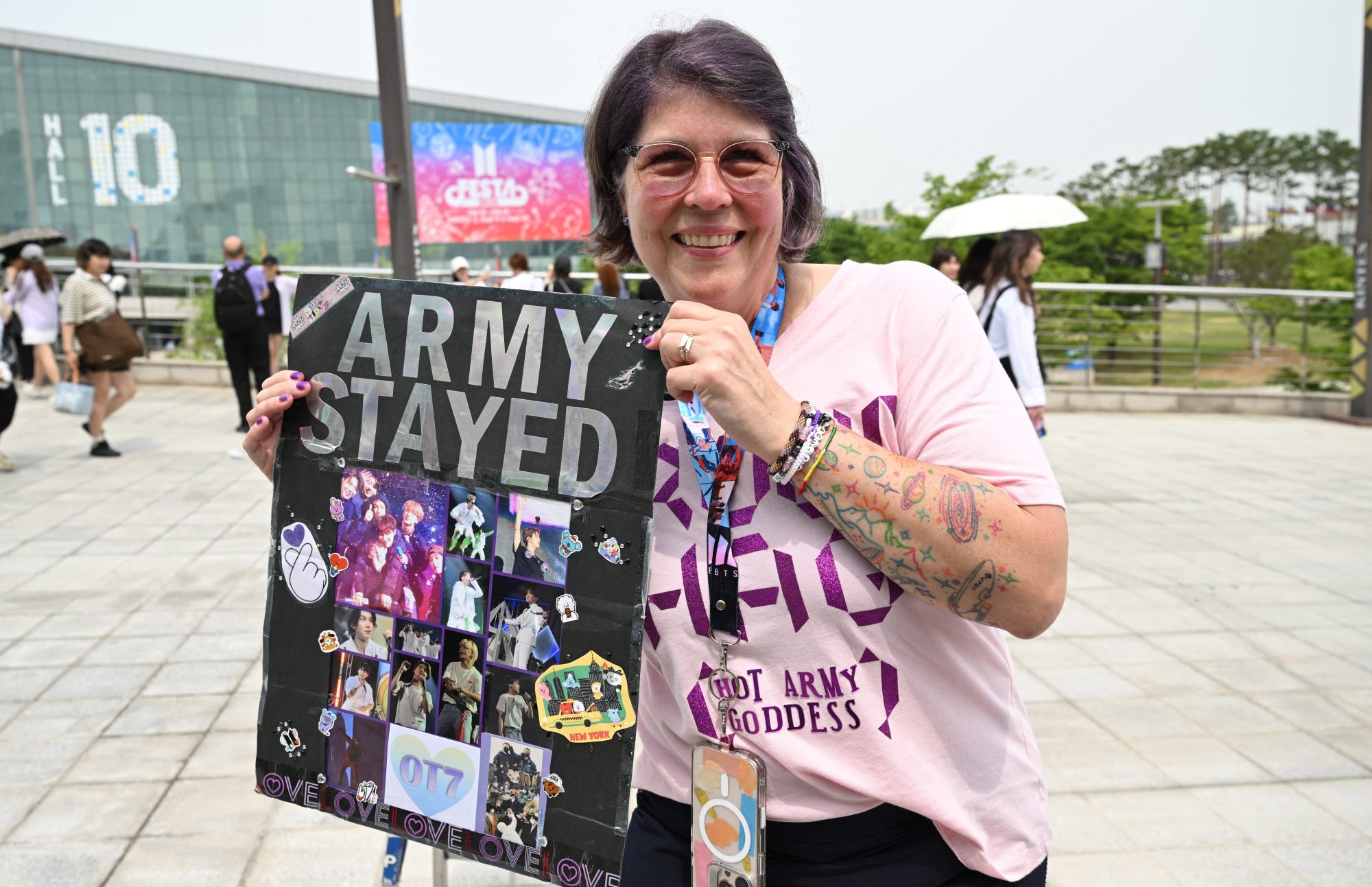 A foreign fan of BTS poses for photos as she attends the annual “BTS Festa” at the Kintex centre in Goyang on June 13. Photo: AFP
