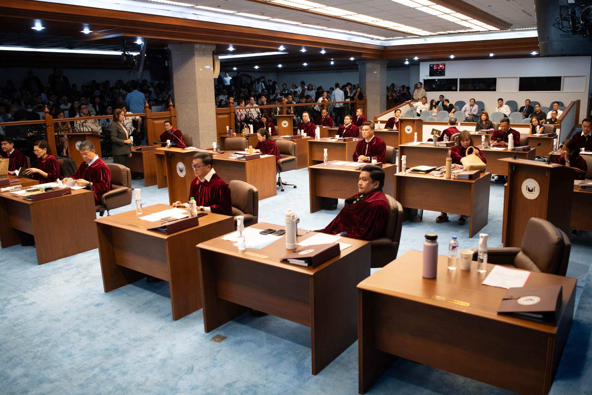 Philippine senators are seated after taking their oath as jurors in the impeachment trial of Vice-President Sara Duterte in Manila on June 10. Photo: AFP