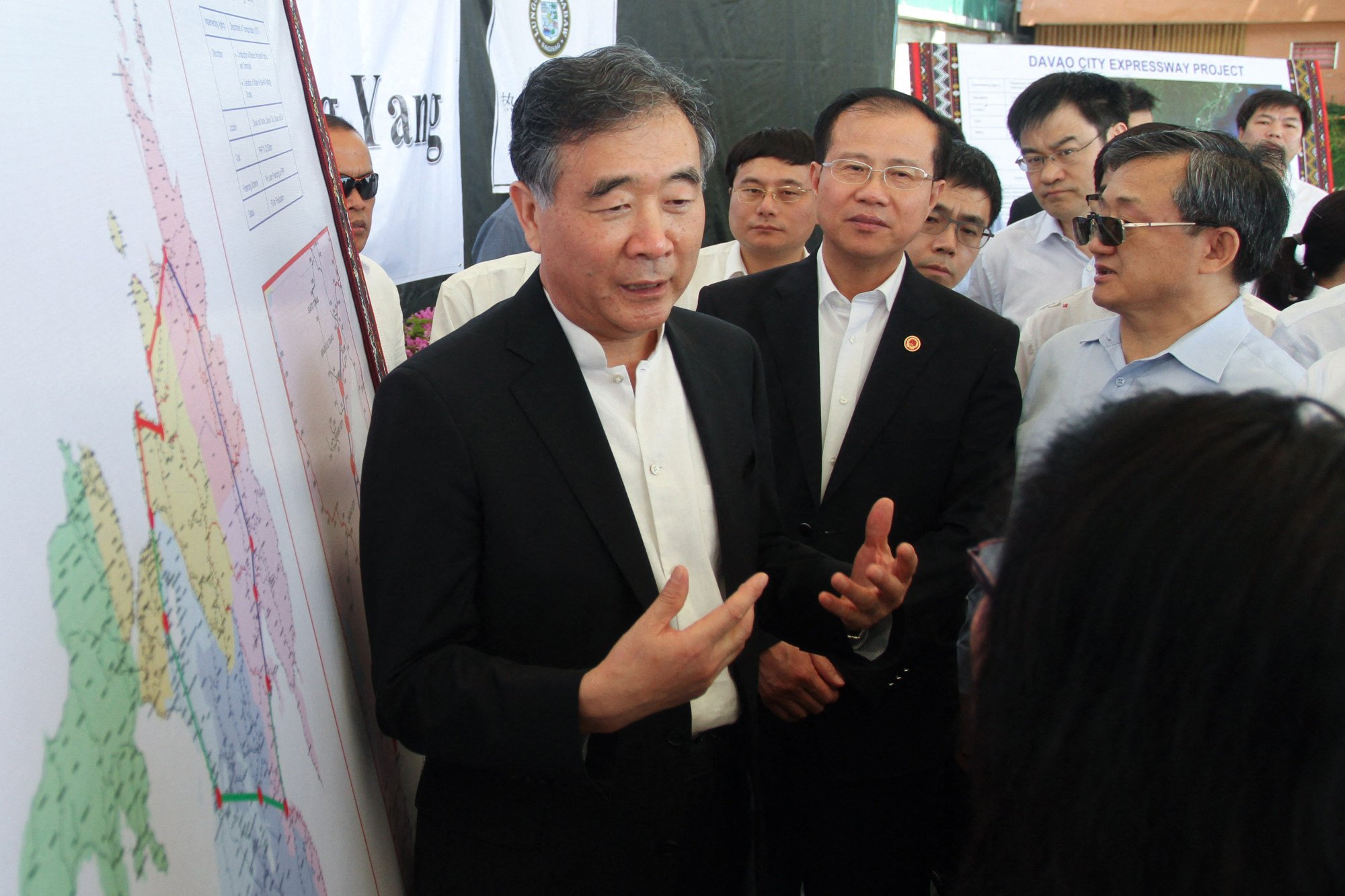 China’s Vice-Premier Wang Yang (centre) speaks in front of a map of the Mindanao Railway Project on Davao City, on the southern island of Mindanao in March 2017. Photo: AFP