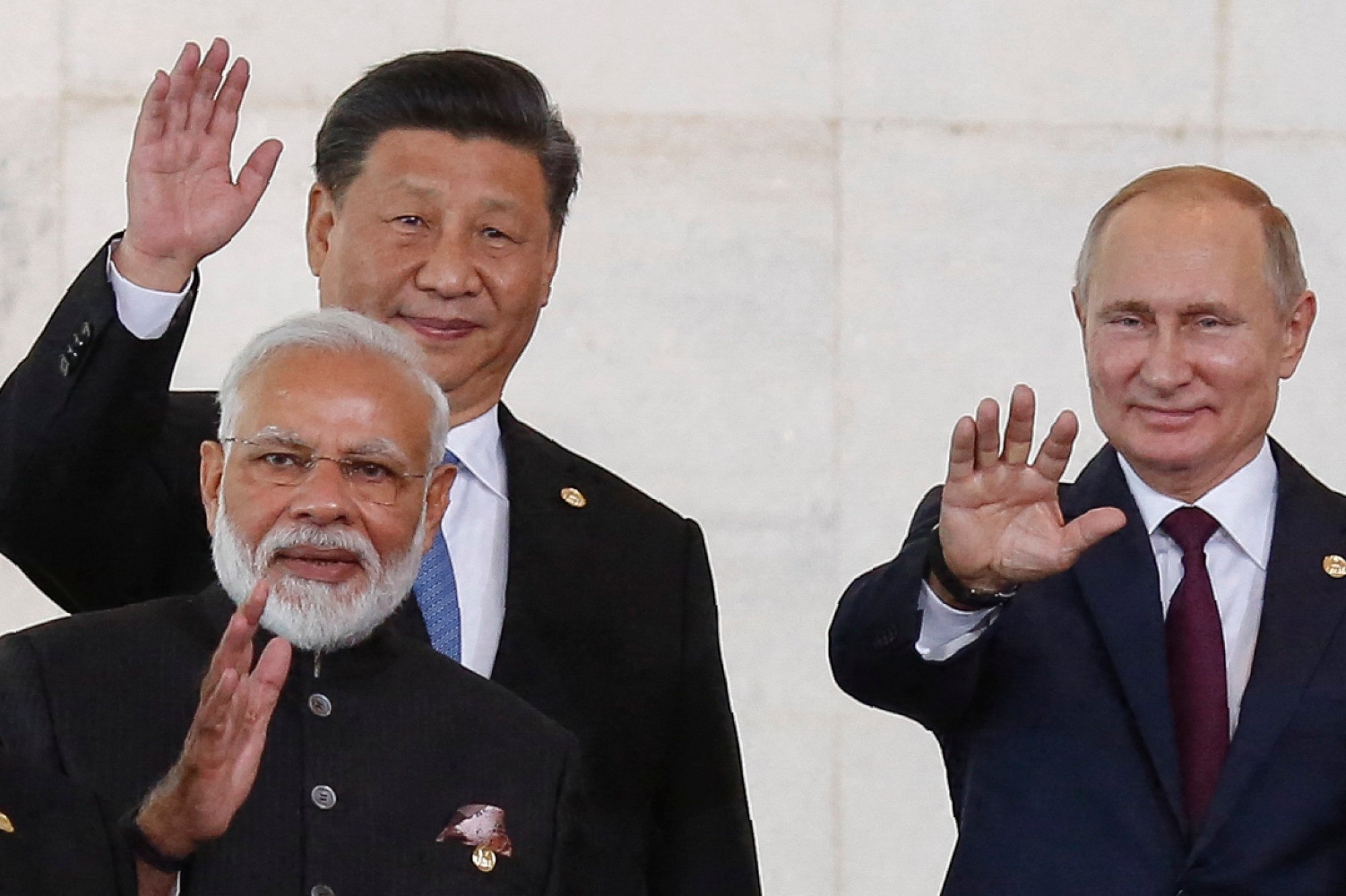 China’s Xi, India’s Modi and Russia’s Putin wave during a Brics summit in 2019. Analysts say Delhi sees reviving RIC as a hedge against growing global instability. Photo: AFP China’s Xi, India’s Modi and Russia’s Putin wave during a Brics summit in 2019. Analysts say Delhi sees reviving RIC as a hedge against growing global instability. Photo: AFP