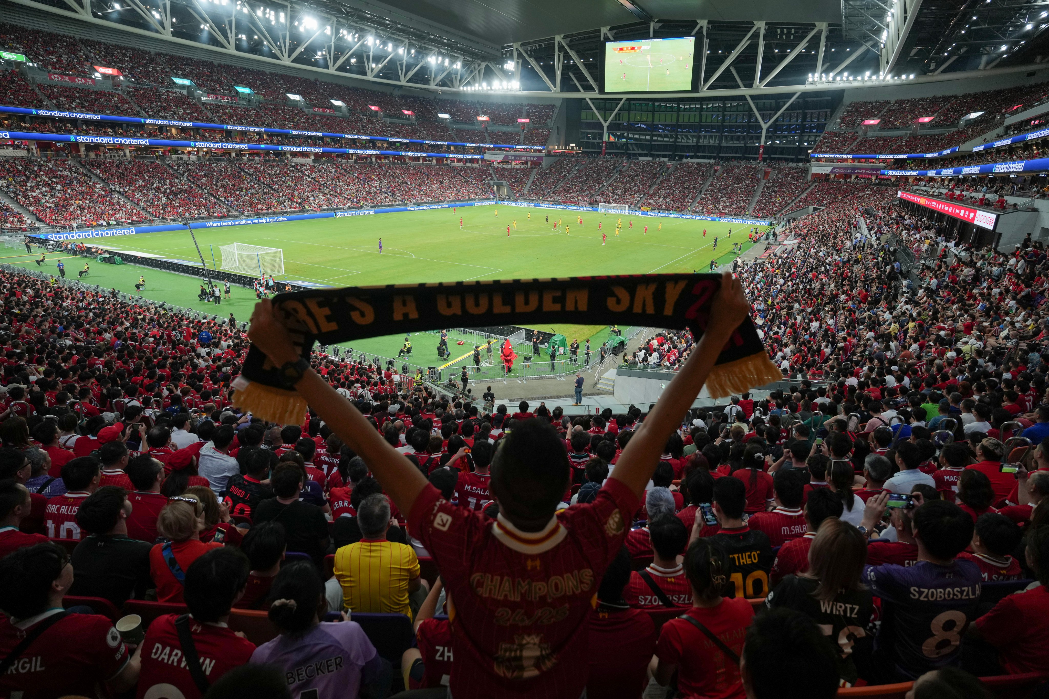Liverpool fans watch their side’s game against AC Milan at Kai Tak Stadium. Photo: Sam Tsang