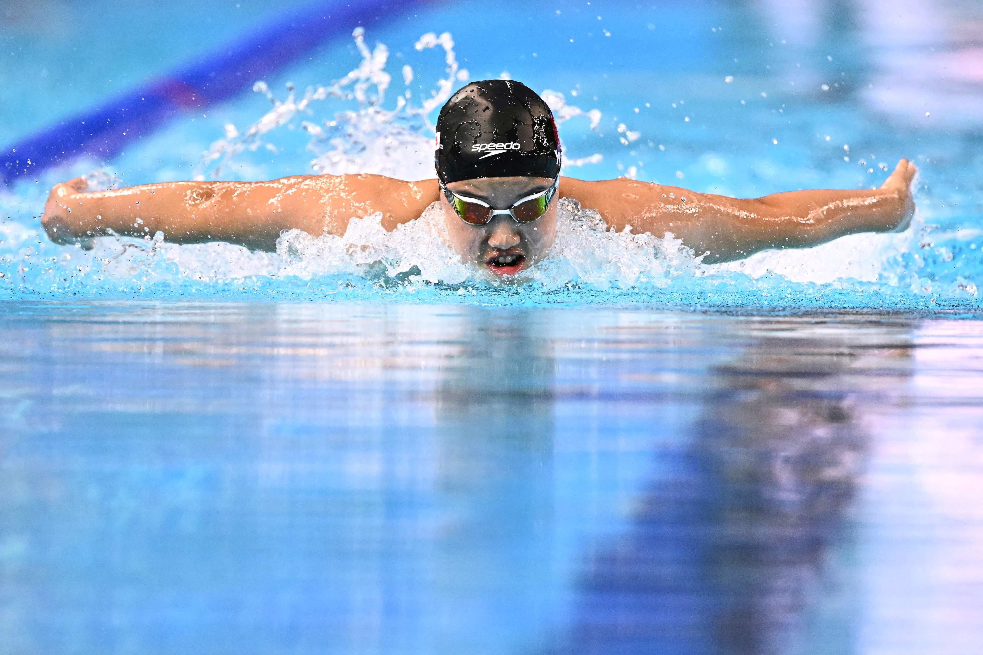 China’s Yu Zidi competes in the heats of the 200m individual medley at the World Aquatics Championships in Singapore on Sunday. Photo: AFP