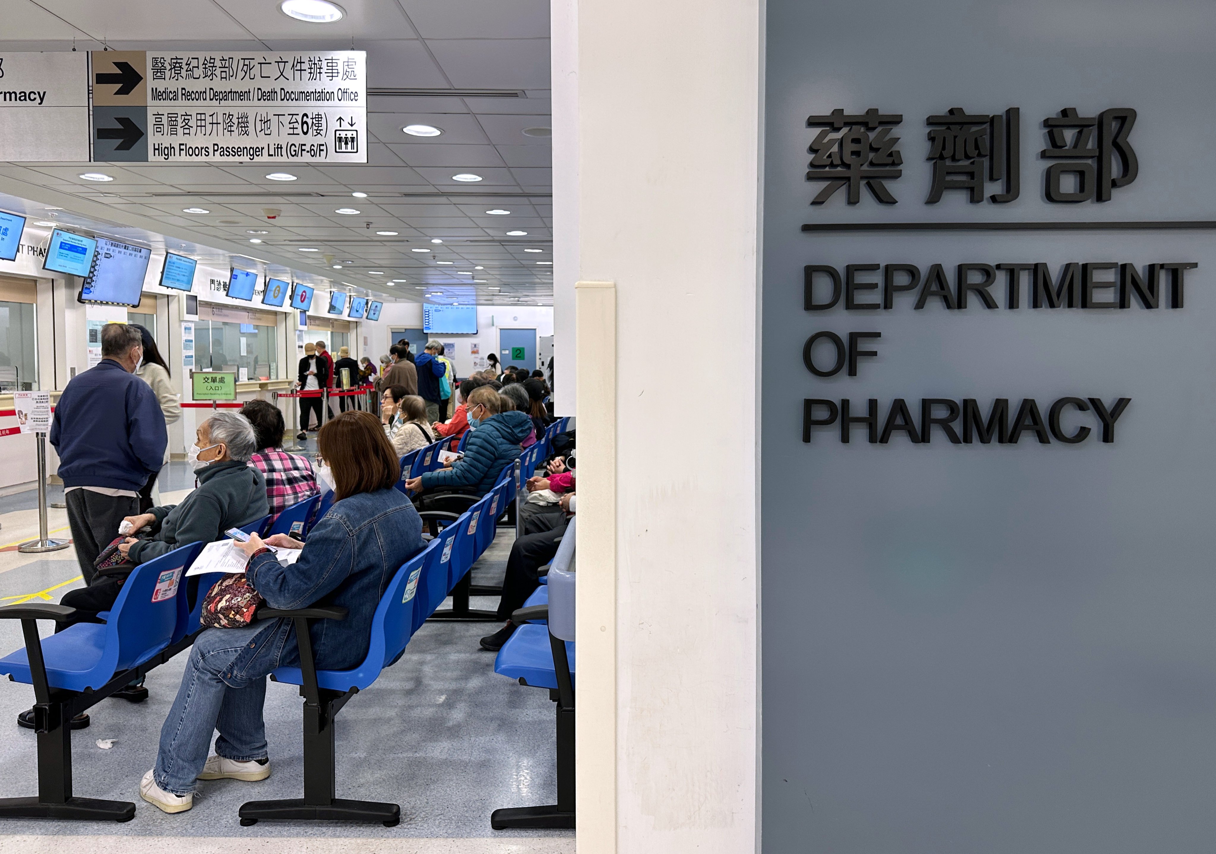 People at the Department of Pharmacy at Caritas Hospital at Cheung Sha Wan on March 11. Photo: Jelly Tse