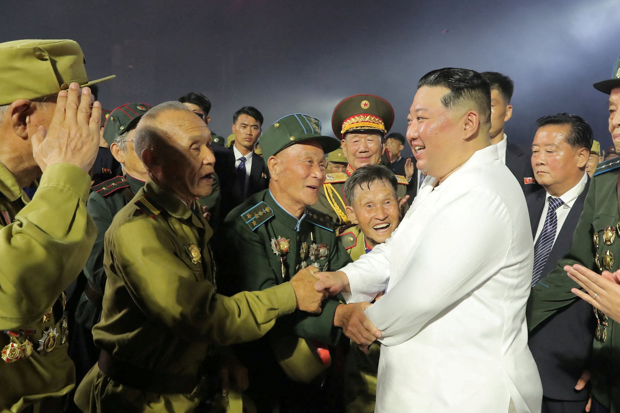 North Korean leader Kim Jong-un meets veterans during a ceremony in Pyongyang marking the 69th anniversary of the Korean war armistice in 2022. Photo: Korean Central News Agency/Reuters