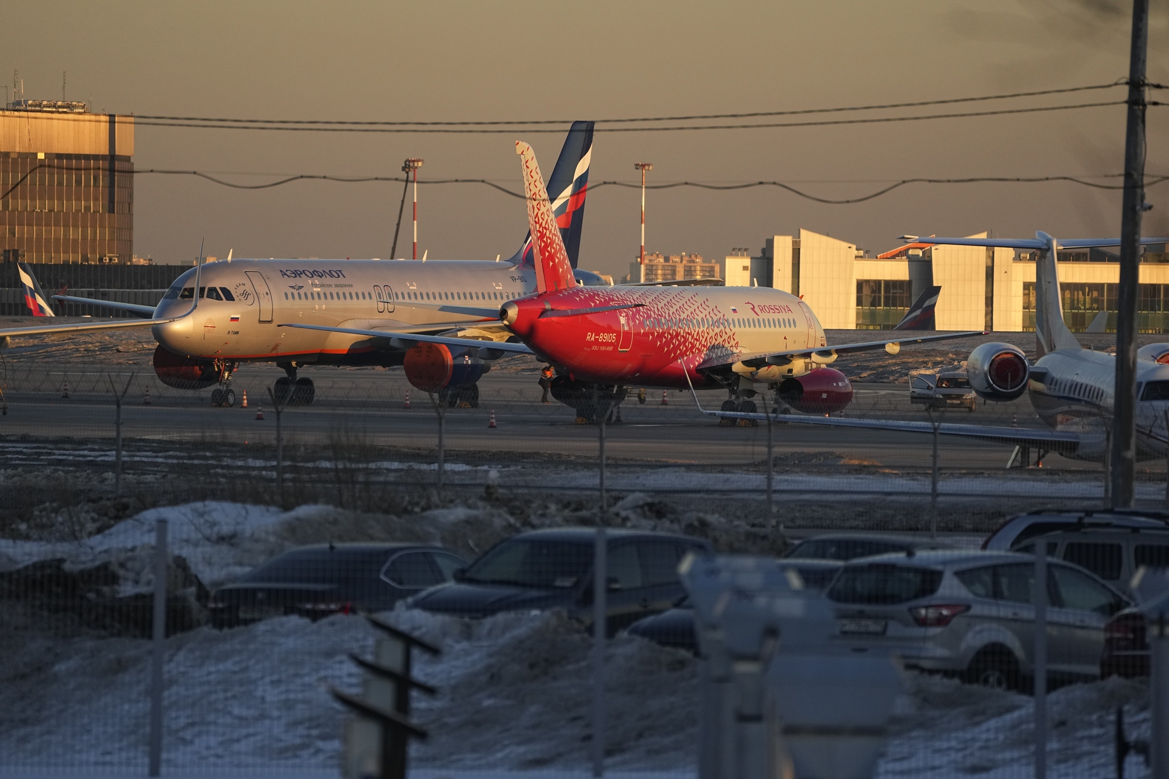 Aeroflot’s passengers planes are parked at Sheremetyevo airport, outside Moscow, Russia. The airline has been forced to cancel flights after a massive cyberattack. Photo: AP