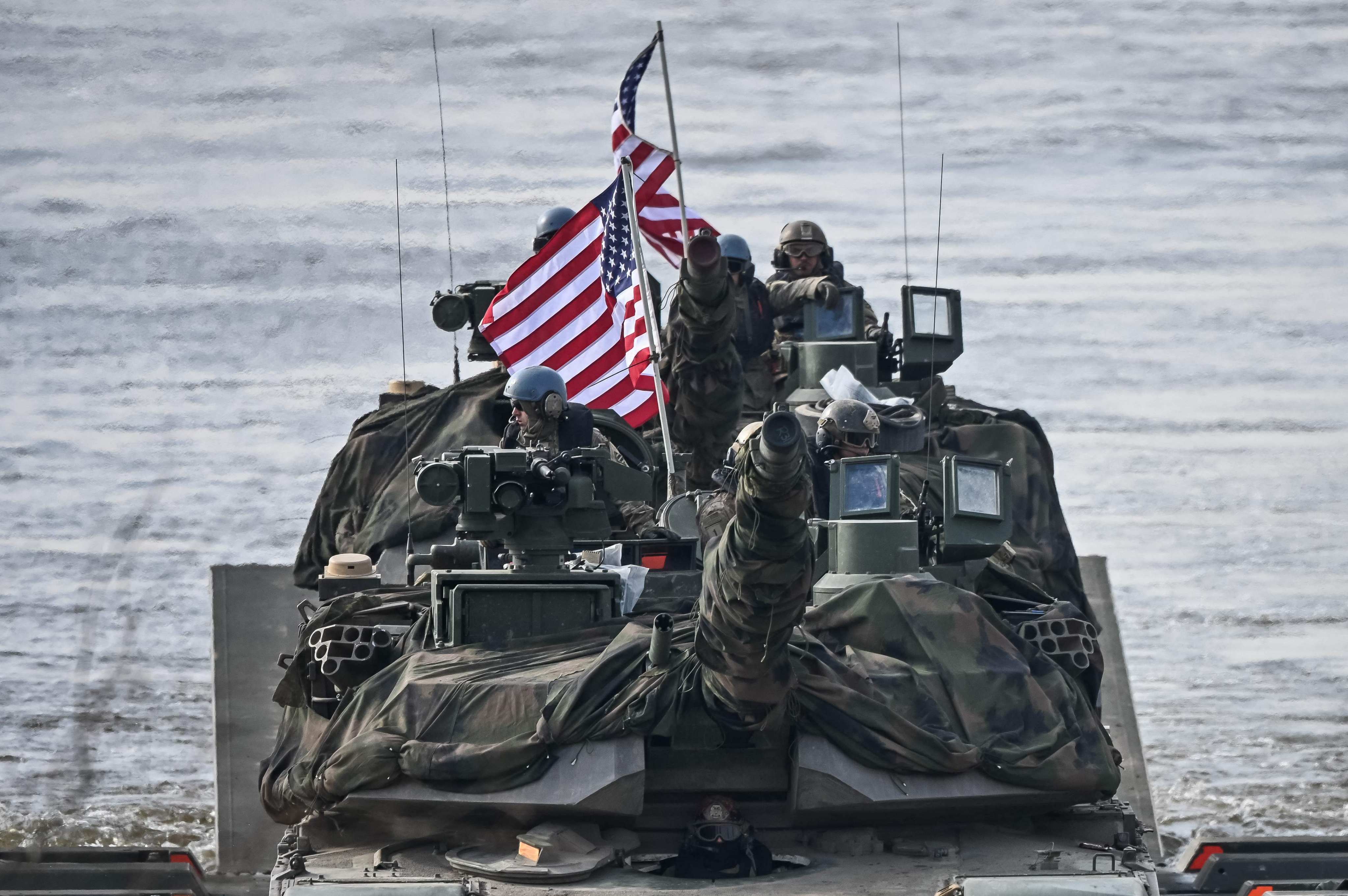 US soldiers on an Abrams tank take part in Nato military exercise in northern Poland in March 2024. Photo: AFP