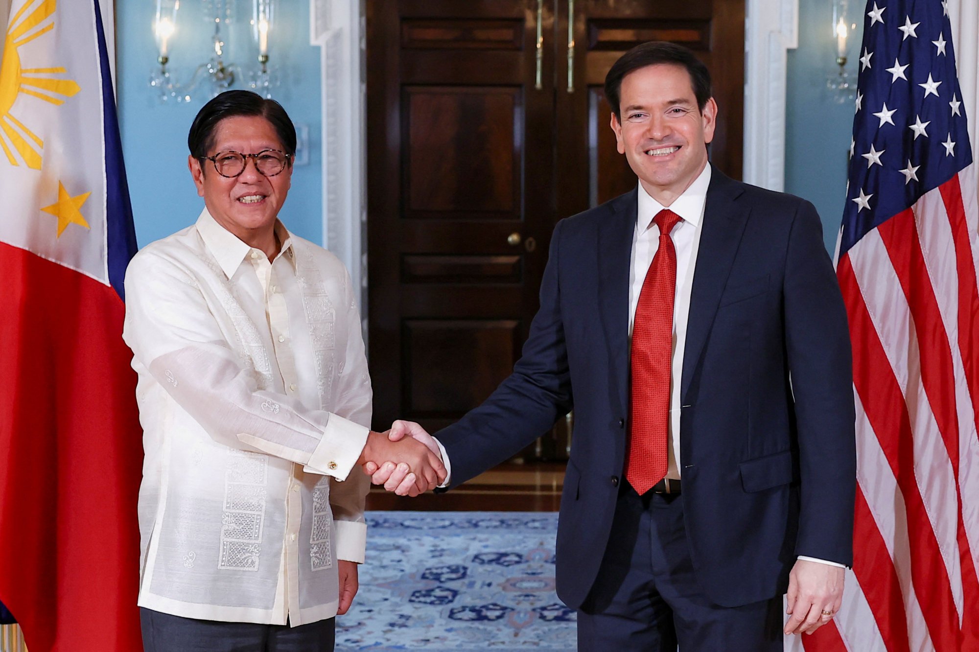 US Secretary of State Marco Rubio shakes hands with Philippine President Ferdinand Marcos Jnr in Washington on July 21. Photo: Reuters US Secretary of State Marco Rubio shakes hands with Philippine President Ferdinand Marcos Jnr in Washington on July 21. Photo: Reuters
