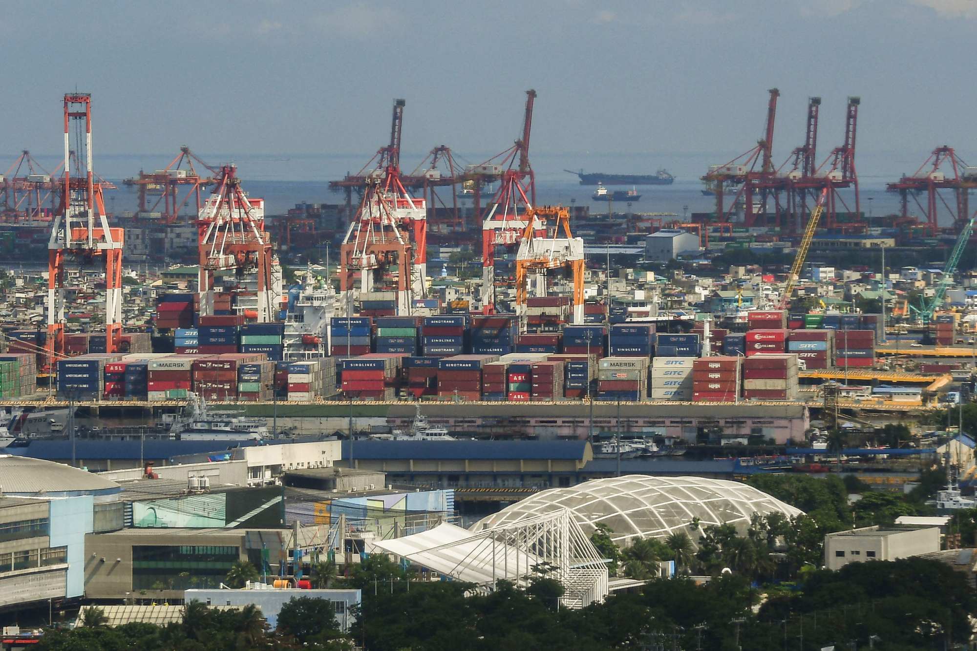 Cranes at the Port of Manila. US President Donald Trump has agreed to reduce threatened tariffs on the Philippines, but only by one percentage point. Photo: AFP Cranes at the Port of Manila. US President Donald Trump has agreed to reduce threatened tariffs on the Philippines, but only by one percentage point. Photo: AFP