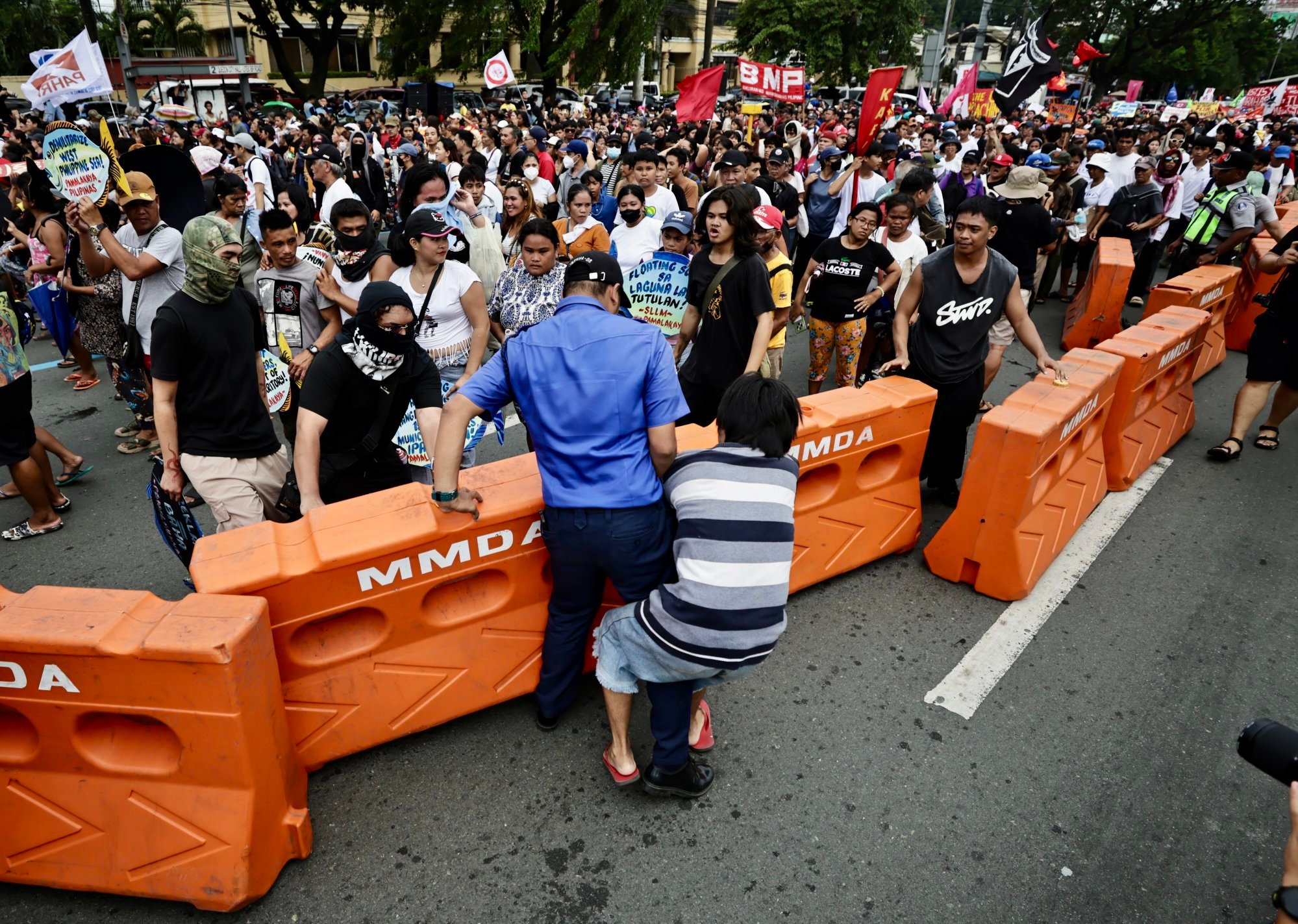 Protesters gather along a road leading to the Philippine Congress in Quezon City where President Ferdinand Marcos Jnr delivers his State of the Nation Address (Sona) on Monday. Photo: EPA