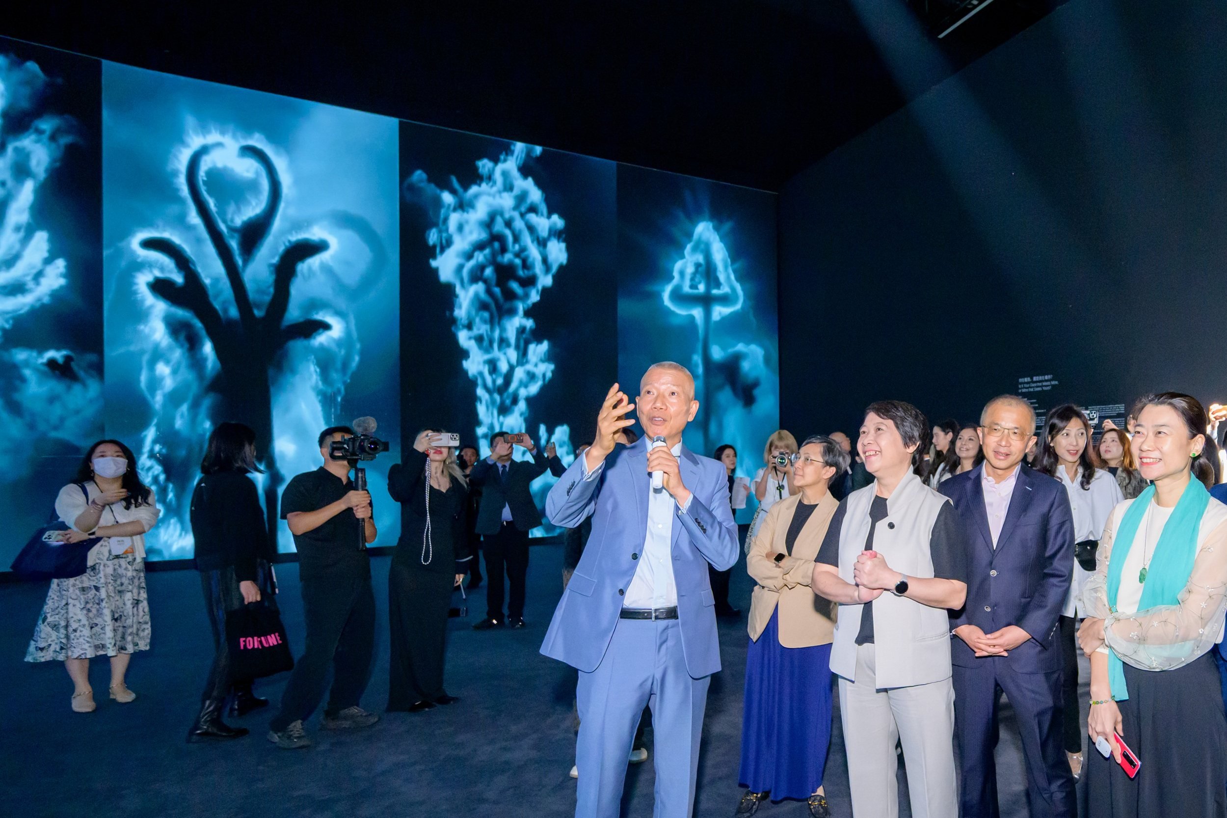 During the opening ceremony in Macau, Cai gave a tour of his exhibition to visitors. Photo: Handout