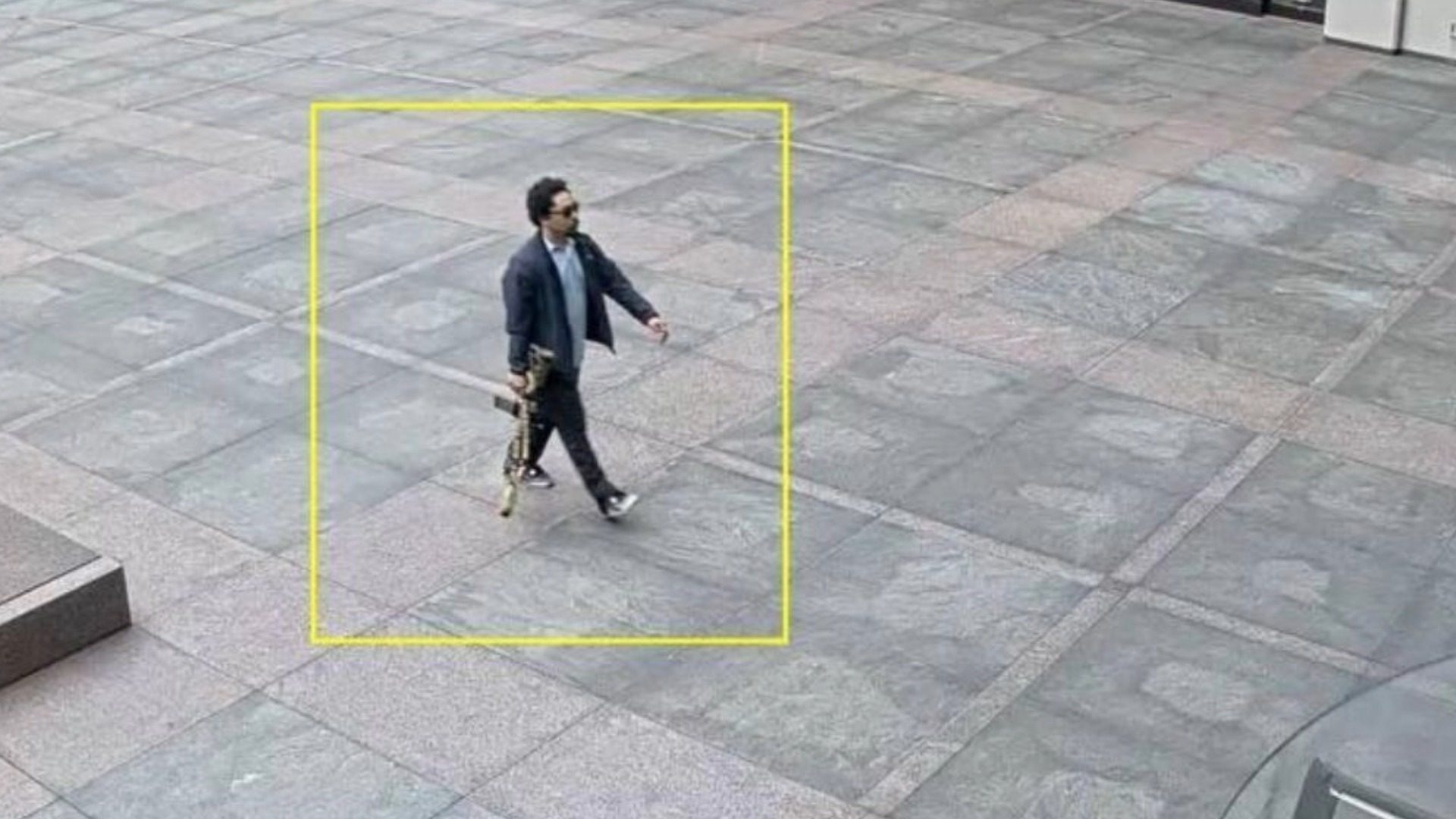 This security camera screenshot shows a man believed to be Shane Tamura, the alleged gunman in the Manhattan shooting incident. Image: NYPD handout
