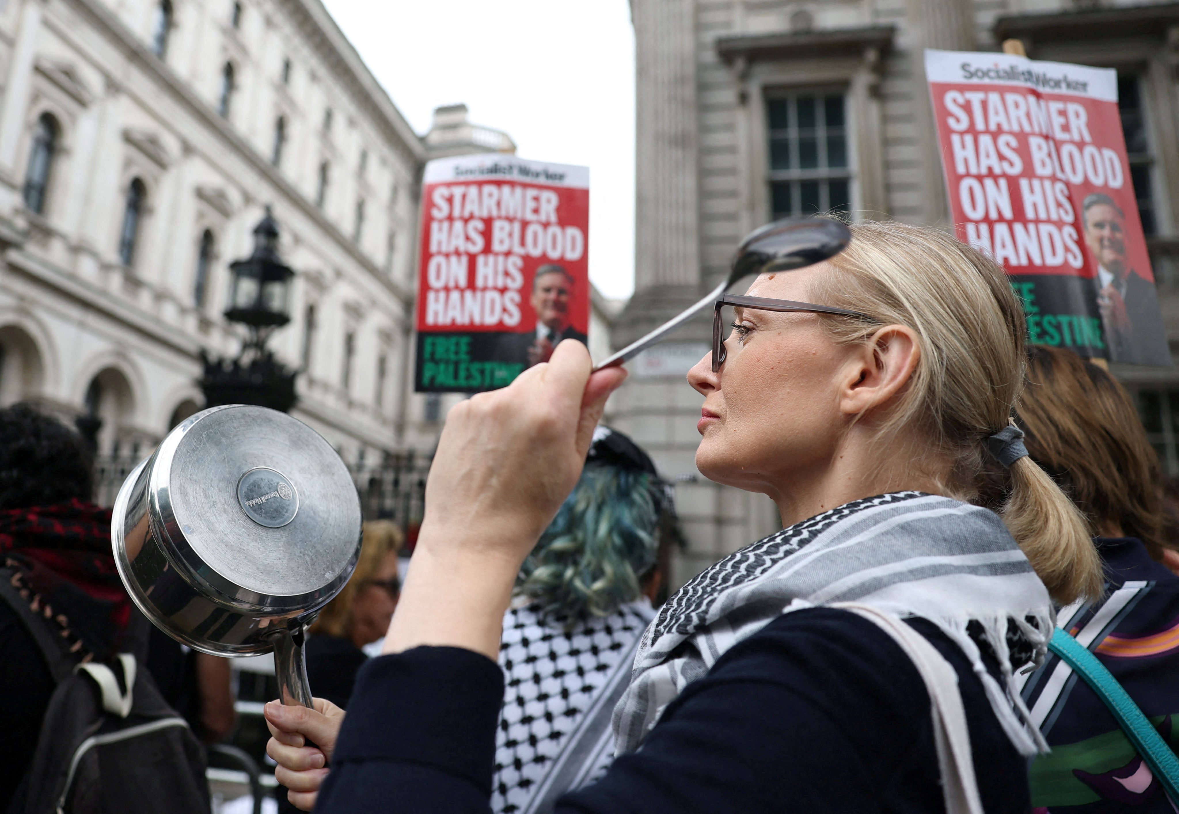 Pro-Palestinian demonstrators outside Downing Street in London as Prime Minister Keir Starmer announced Britain will recognise the state of Palestine in September unless the Israeli government commits to a peace process. Photo: Reuters
