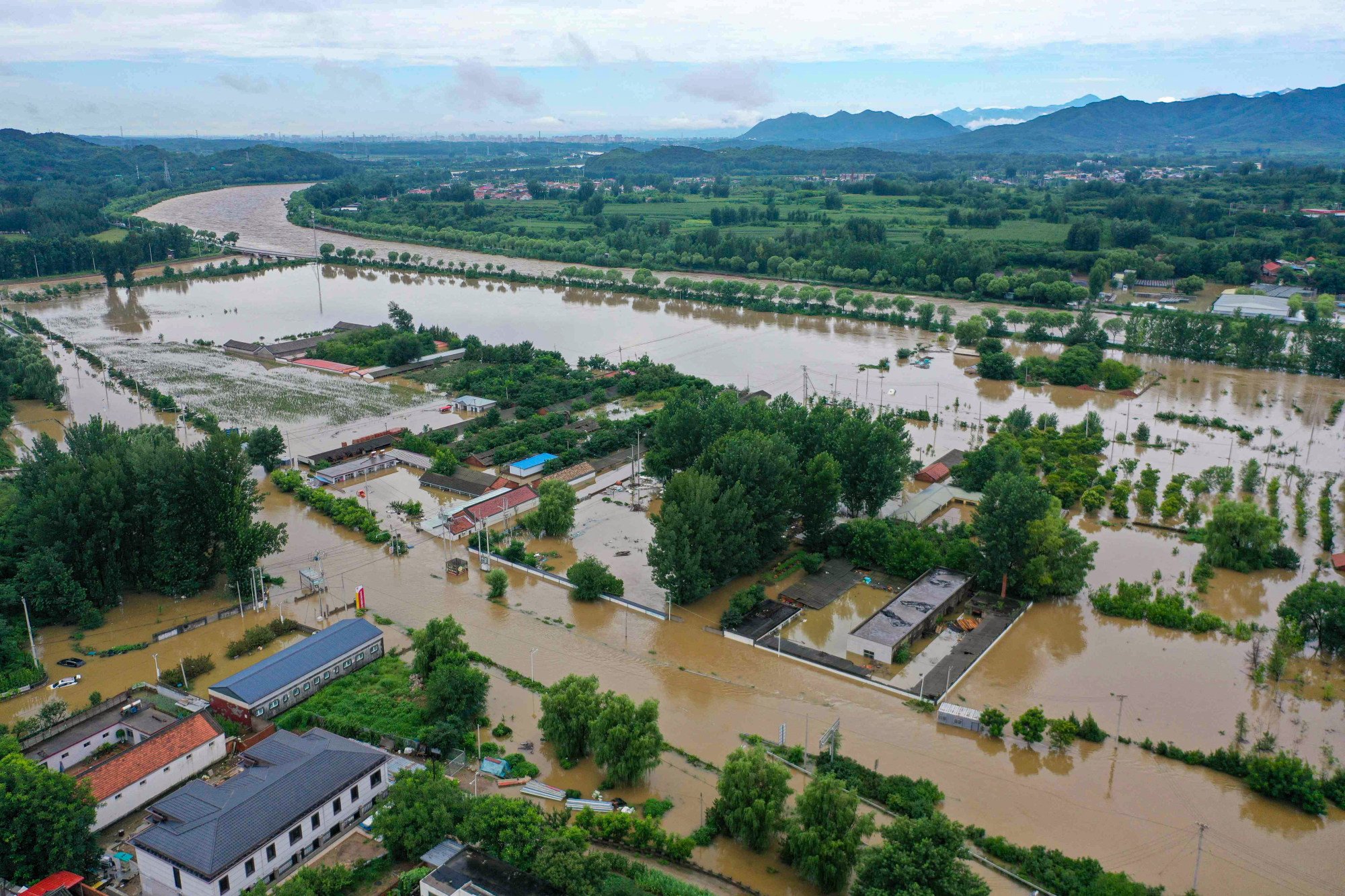 An aerial view of Xinanjuang village in Miyun district, on the outskirts of Beijing on Tuesday. Photo: AFP